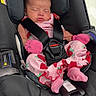 baby, car_seat, child, closed_eyes, harness, indoors, infant, mittens, newborn, pacifier, peaceful, pink_outfit, portrait, safety_seat, seatbelt, sleeping, sock, strawberry_pattern, travel, vehicle