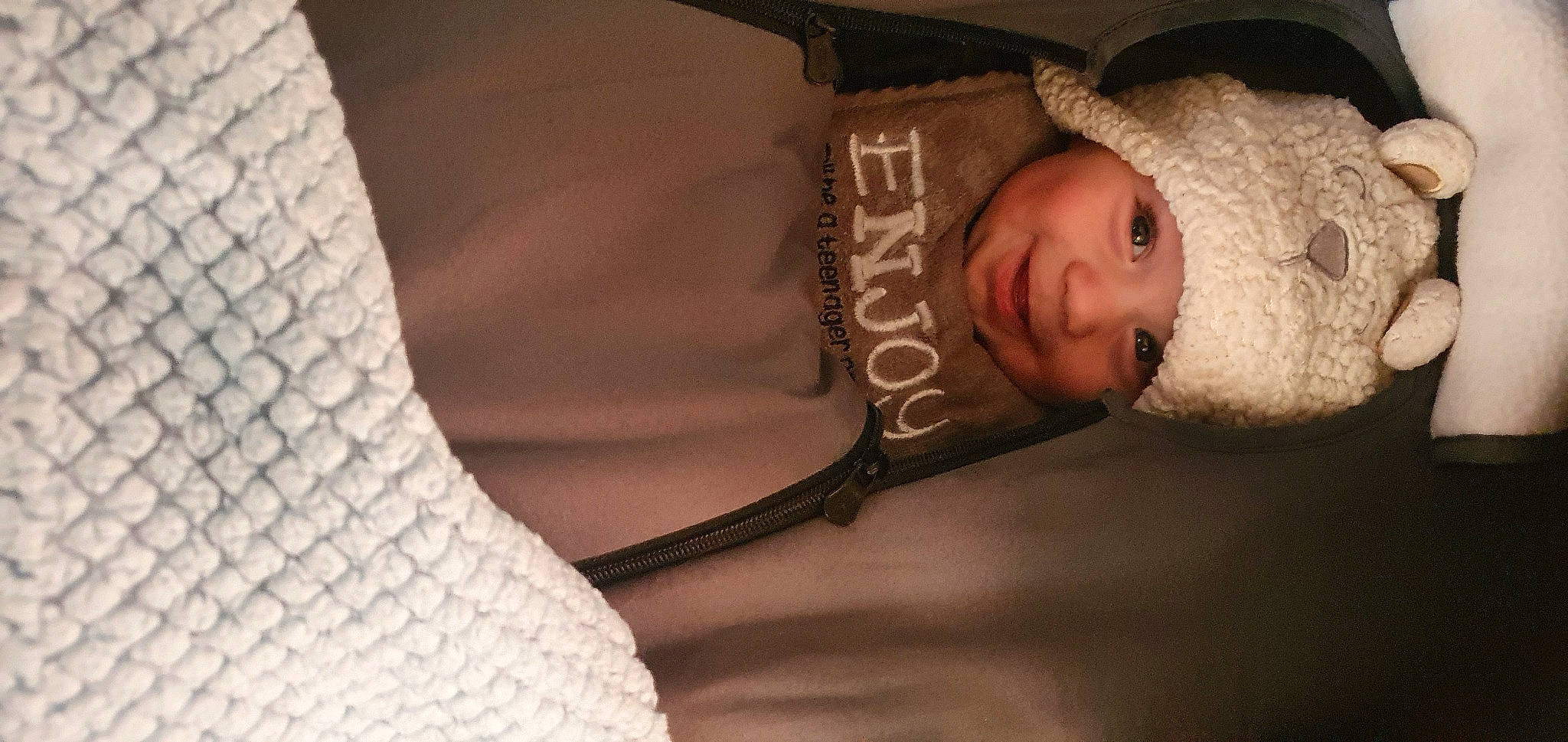 Kingstyn is registered to the contest to win money with this photo: baby, baby_toddler_clothing, chest, comfort, elbow, eye, flash_photography, head, headwear, human_body, human_leg, knee, lip, mammal, person, skin, sleeve, tints_and_shades, toddler, trunk