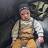 Jerico joined the competition — help win amazing prizes! baby, bear_design, blanket, brown_pants, child, clothing, cute, expression, face, hat, headwear, indoor, infant, leather_couch, person, portrait, seated, suspenders, white_shirt, young
