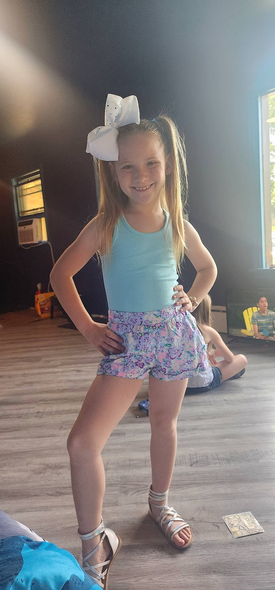 Felicity is registered to the contest to win money with this photo: beauty, dance, entertainment, eye, facial_expression, fun, hair, hairstyle, happy, hat, joint, joy, knee, long_hair, neck, person, sleeve, smile, standing, thigh