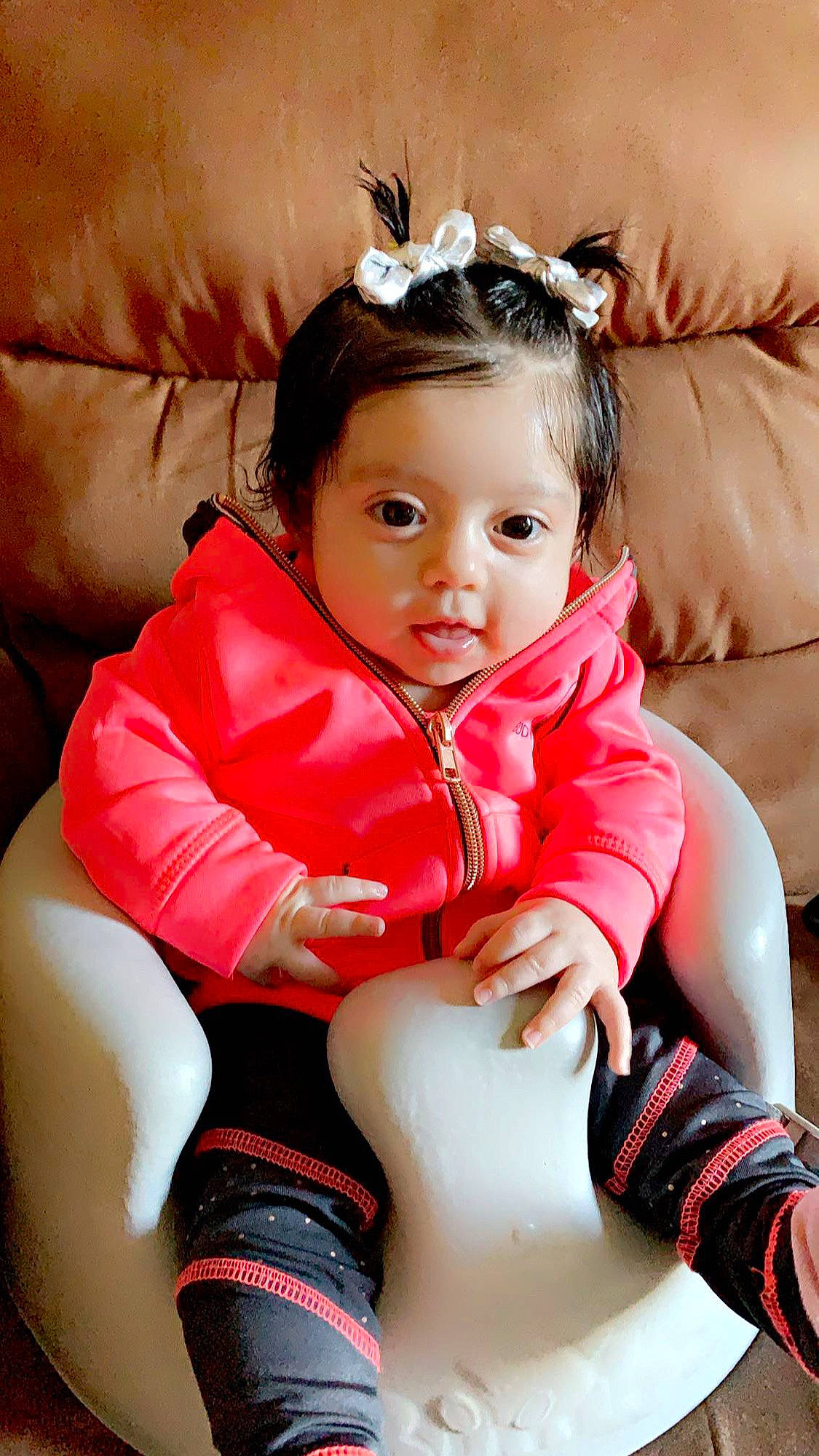 Adriana is registered to the contest to win money with this photo: abdomen, baby_toddler_clothing, black_hair, brown_hair, child, comfort, flash_photography, happy, human_leg, knee, leg, lip, person, pink, skin, sleeve, smile, thigh, toddler, trunk