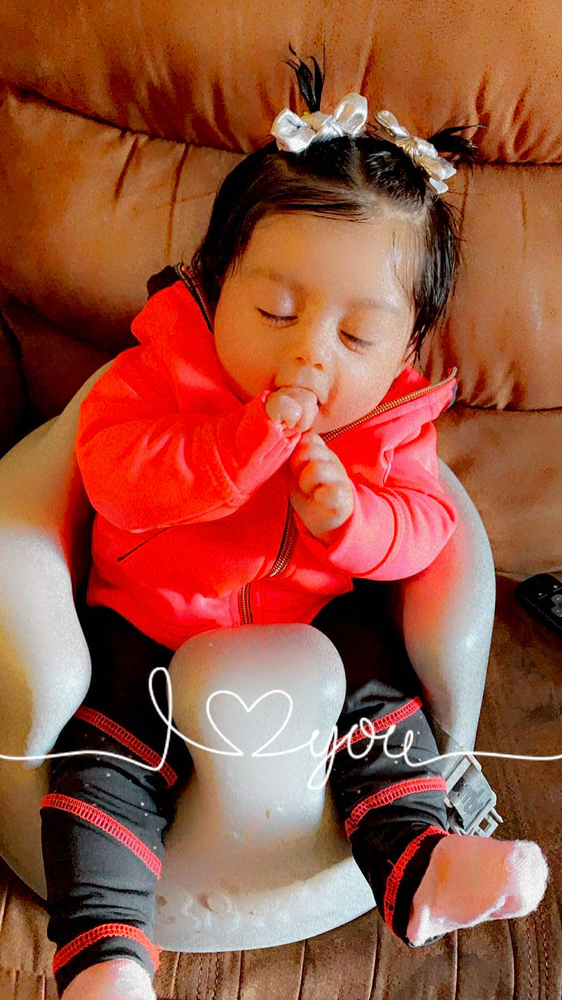 Adriana is registered to the contest to win money with this photo: abdomen, baby, baby_toddler_clothing, beauty, chest, child, finger, happy, human_leg, knee, mouth, nail, person, pink, sitting, skin, textile, thigh, toddler, trunk