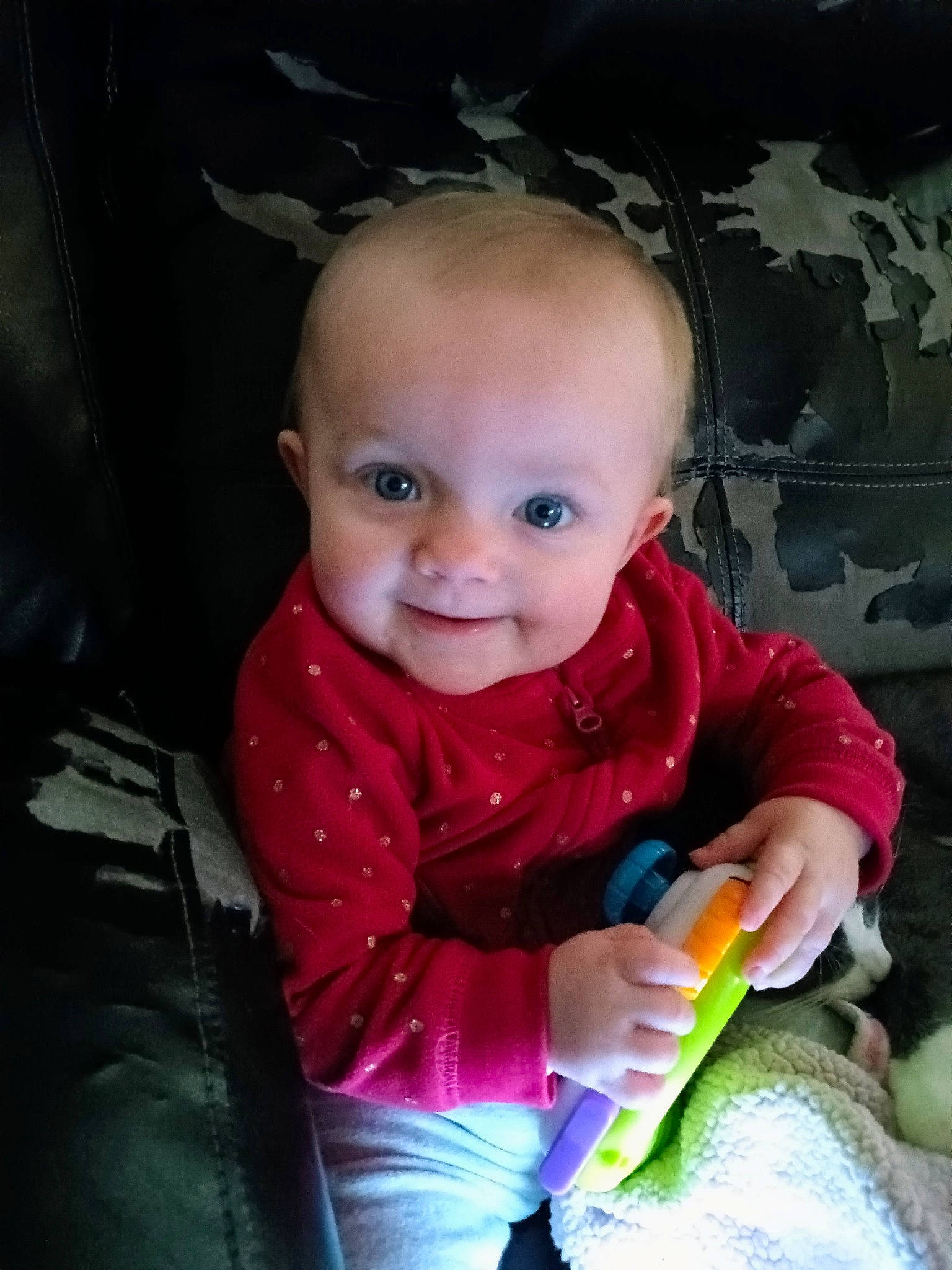 Jemma is registered to the contest to win money with this photo: baby, baby_carriage, baby_products, baby_toddler_clothing, cheek, child, flash_photography, fun, happy, iris, joy, laugh, magenta, person, play, portrait_photography, sitting, skin, smile, toddler