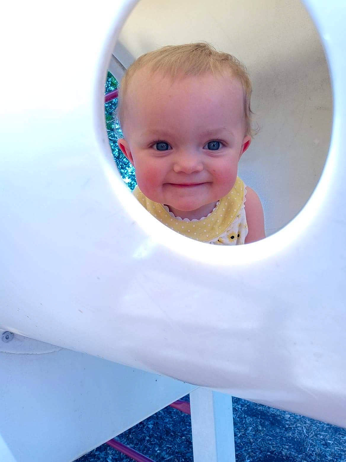 Jemma joined the competition — help win amazing prizes! baby, baby_toddler_clothing, blue, child, circle, electric_blue, fun, hair, happy, joy, laugh, leisure, magenta, outdoor_play_equipment, oval, person, pink, playground, recreation, smile