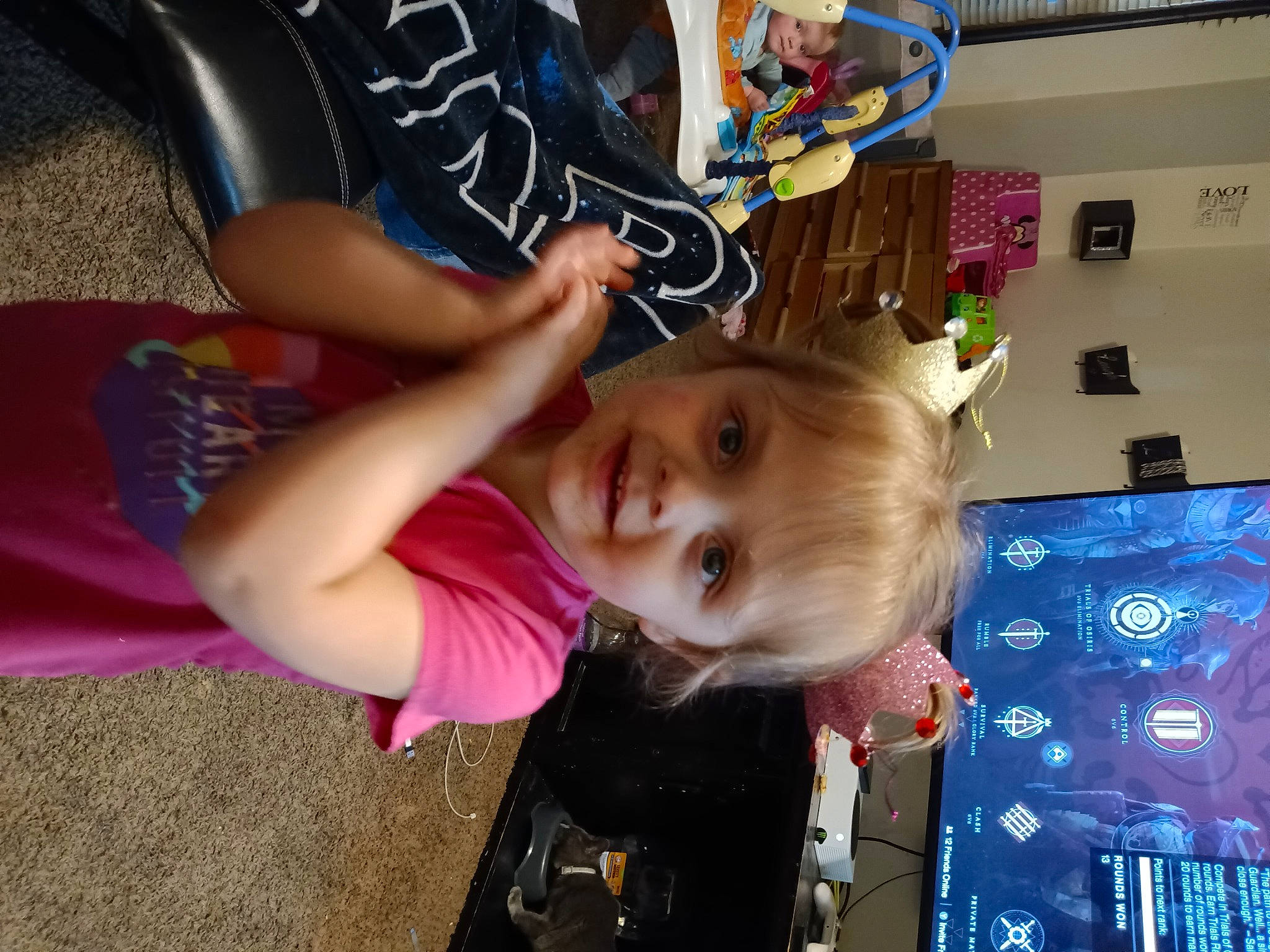 Kaelynn joined the competition — help win amazing prizes! arm, baby, child, ear, fun, hair_coloring, happy, leisure, magenta, person, play, room, sitting, t_shirt, television_set, toddler, vacation