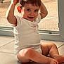 toddler, child, indoor, floor, sunglasses, smile, playful, white_clothing, barefoot, window, natural_light, happy, cute, baby, person, young_child, skin, legs, head, expression