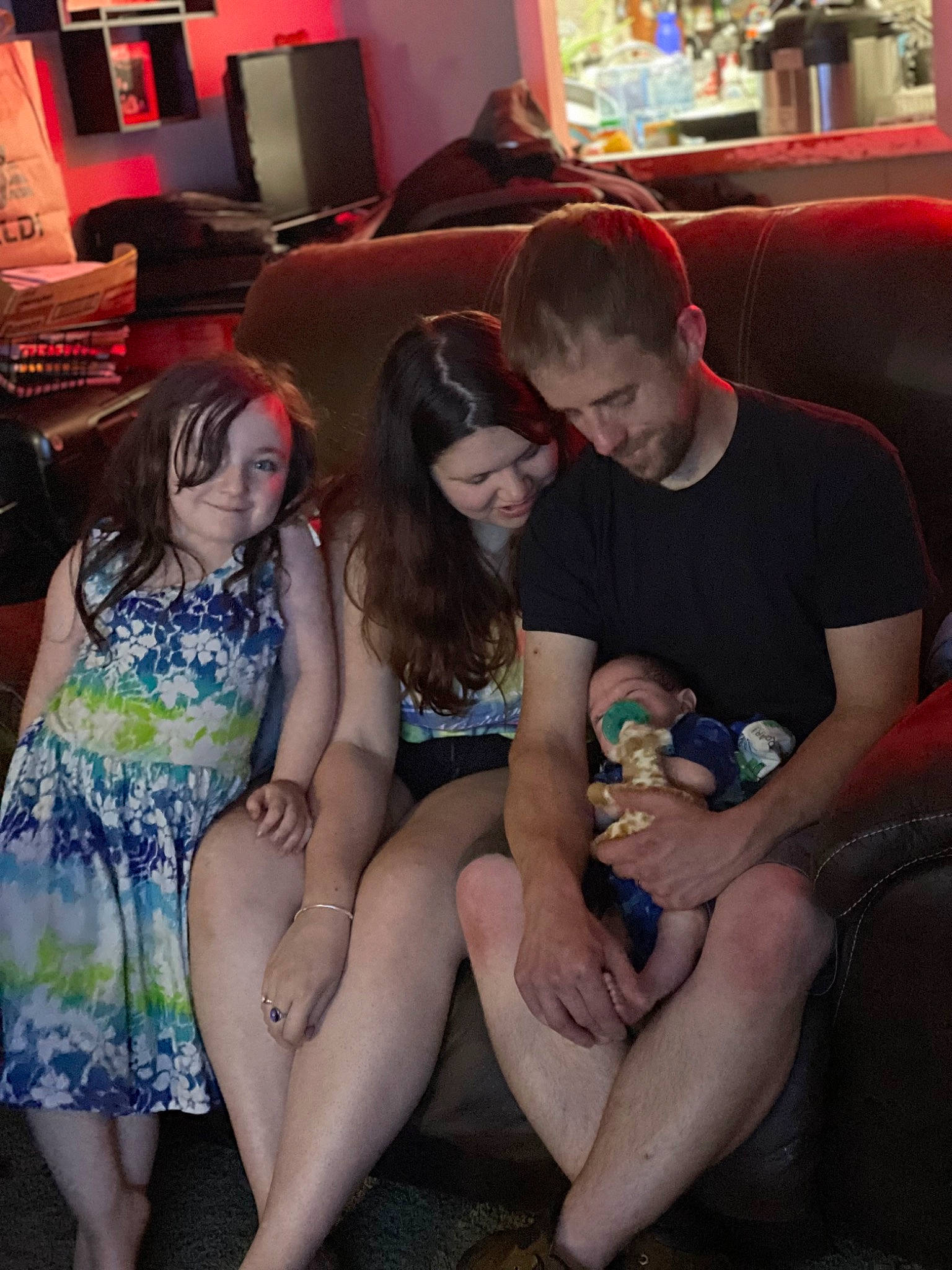 Clark joined the competition — help win amazing prizes! black_hair, comfort, couch, facial_expression, fashion, finger, friendship, fun, hairstyle, interaction, joy, lap, leg, leisure, mouth, person, shorts, smile, social_group, summer