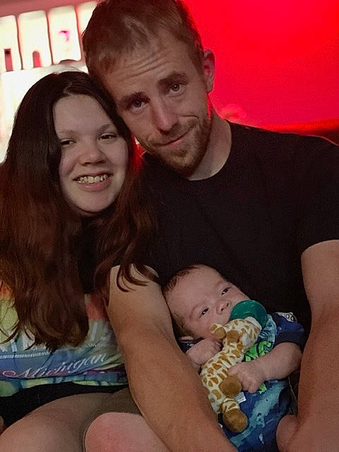 Clark is registered to the contest to win money with this photo: arm, eye, face, facial_expression, hand, happy, head, human, human_body, interaction, iris, joy, mouth, muscle, organ, person, photograph, product, skin, smile