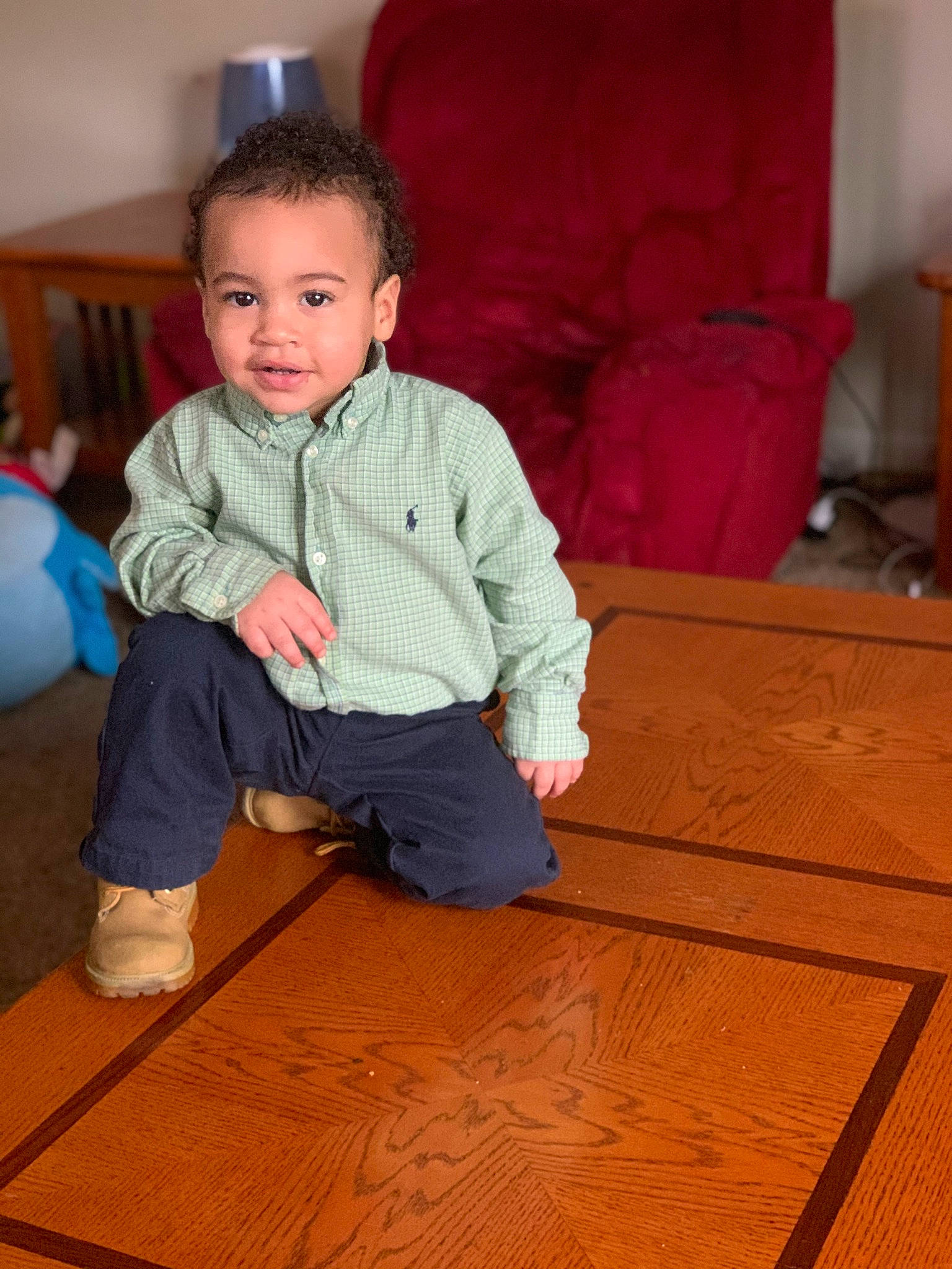 Zander is registered to the contest to win money with this photo: baby_toddler_clothing, ball, cabinetry, child, floor, flooring, hardwood, interior_design, knee, lamp, living_room, person, room, sitting, sock, toddler, toy, varnish, wood, wood_flooring