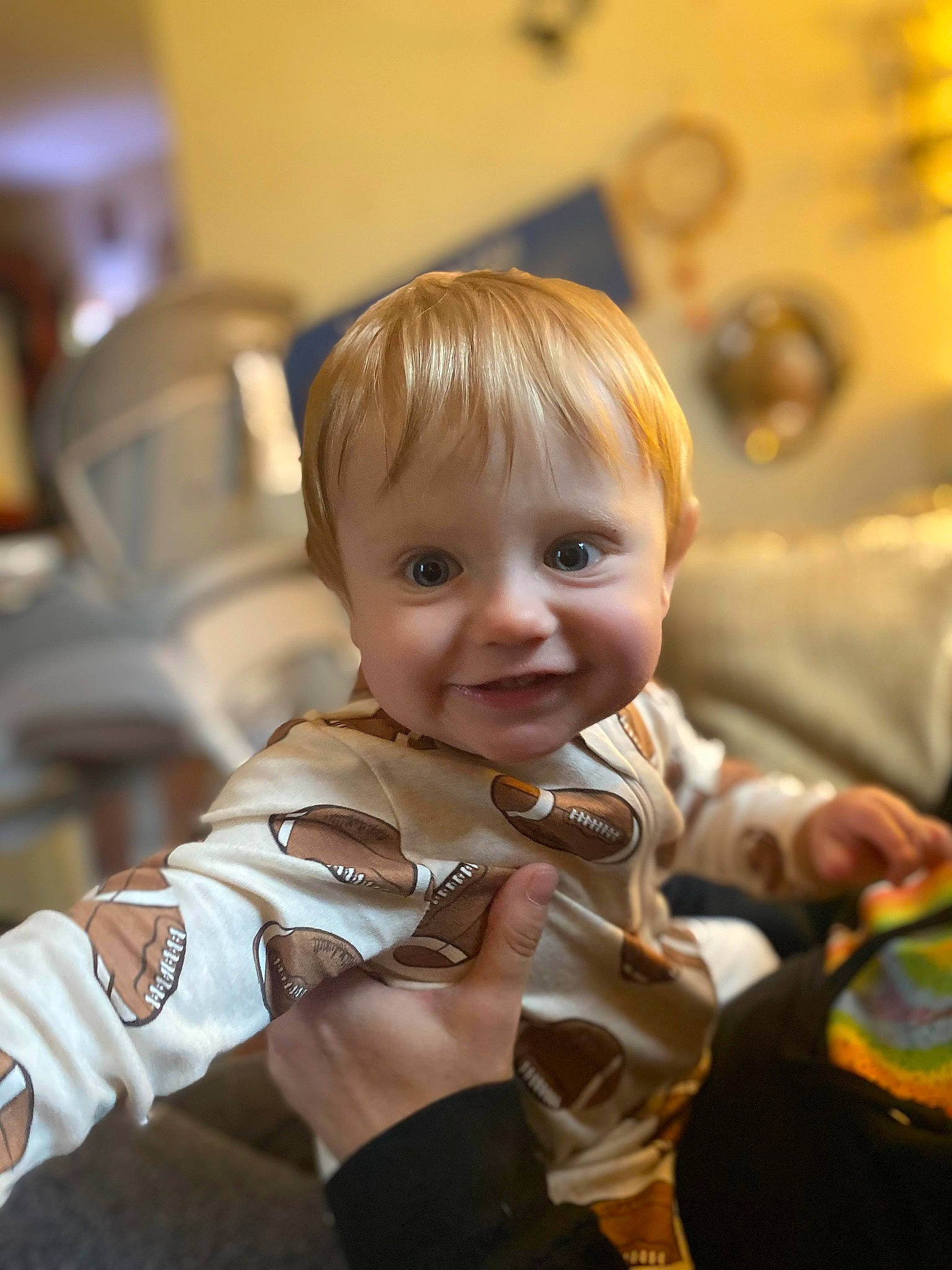 Elisha joined the competition — help win amazing prizes! baby, blond, cheek, child, event, eye, flooring, fun, happy, joy, person, room, sitting, smile, toddler, vacation, wood