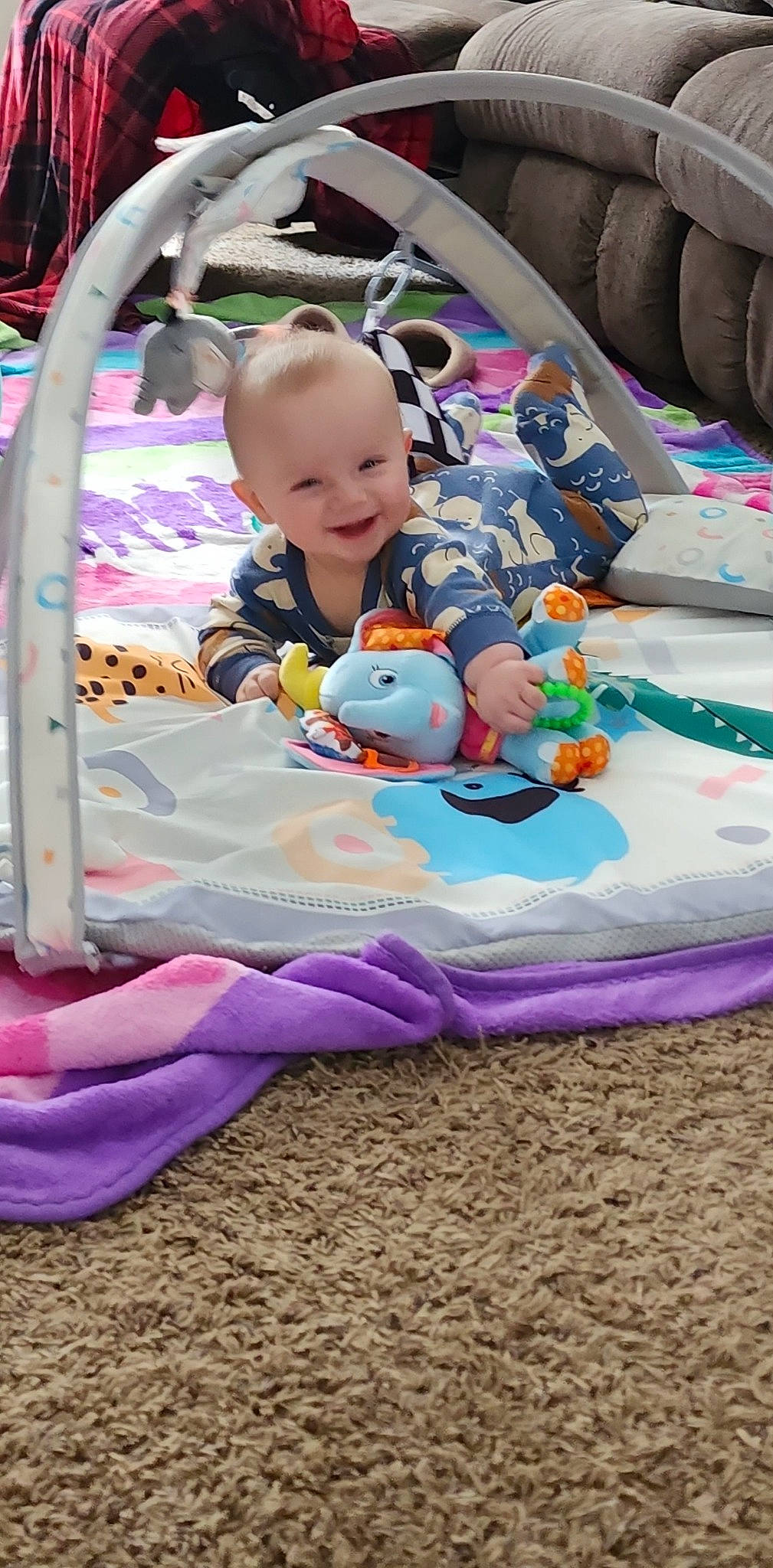 Winston joined the competition — help win amazing prizes! baby, baby_playing_with_toys, baby_products, baby_toddler_clothing, baby_toys, child, event, fun, happy, joy, leisure, linens, magenta, person, pink, play, purple, recreation, sitting, smile
