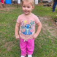 Logan joined the competition — help win amazing prizes! child, girl, outdoor, grass, pink_clothing, white_shoes, playful, standing, messy_face, casual, backyard, trees, person, stitch_tshirt, pants, smiling, hands_on_hips, dirt, daylight, man