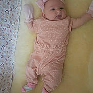 Chelsea is registered to the contest to win money with this photo: baby, bed, blanket, bodypart, bonnet, clothing, crib, face, finger, furniture, hat, head, hosiery, infantbed, newborn, person, photography, portrait, sleeping, sock