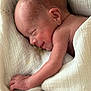 newborn, baby, sleeping, blanket, soft, peaceful, infant, skin, hand, face, ear, smile, closeup, rest, cozy, wrapped, cute, child, portrait, lying_down