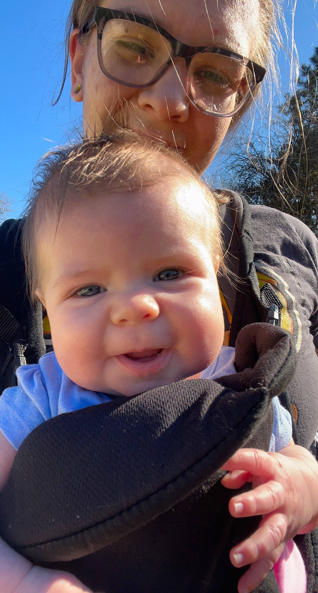 Roselyn is registered to the contest to win money with this photo: azure, blue, cheek, chin, eye, eyebrow, hairstyle, hand, happy, headwear, light, lip, mouth, nose, organ, person, photograph, skin, sky, smile