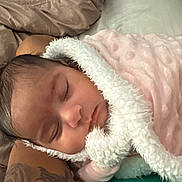 Amiah joined the competition — help win amazing prizes! baby, sleeping, blanket, pink, white, tattoo, arm, bed, bedding, soft, cozy, infant, face, peaceful, rest, person, skin, indoors, comfort, closeup