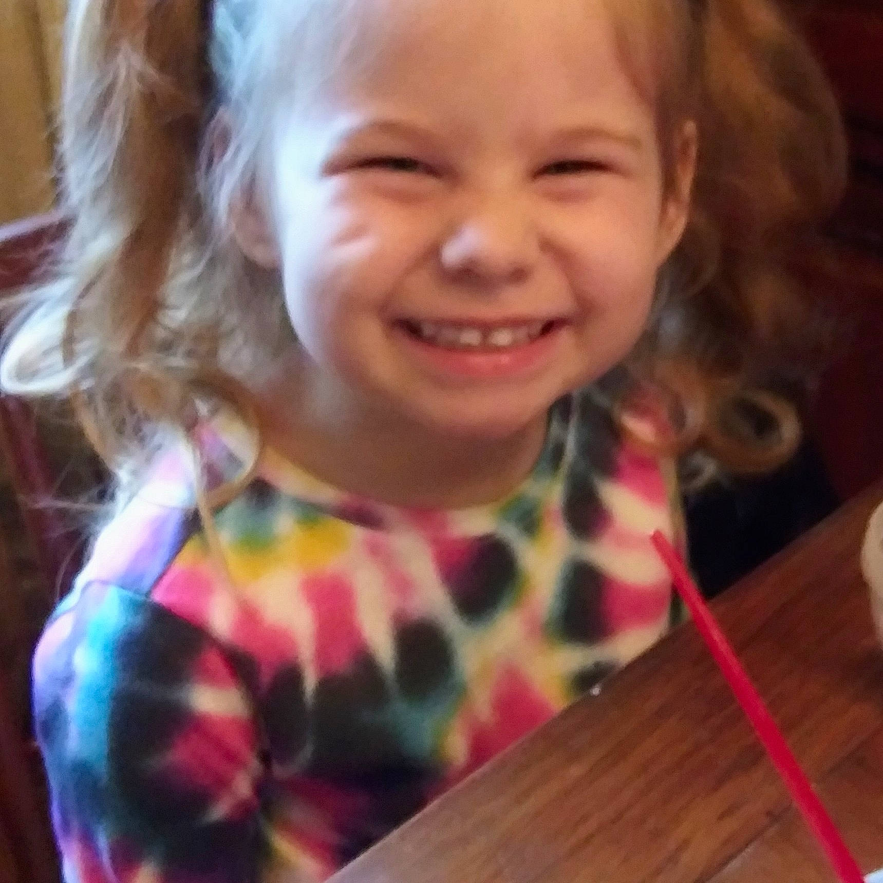 Kinzleigh is registered to the contest to win money with this photo: chair, cheek, ear, eye, finger, fun, hair, happy, head, iris, joy, lip, mouth, nose, person, skin, smile, table, tableware, toddler