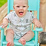 Noah is registered to the contest to win money with this photo: baby, babylaughing, chair, clothing, crib, dress, face, furniture, happy, head, infantbed, laughing, person, photography, portrait, rockingchair, sitting