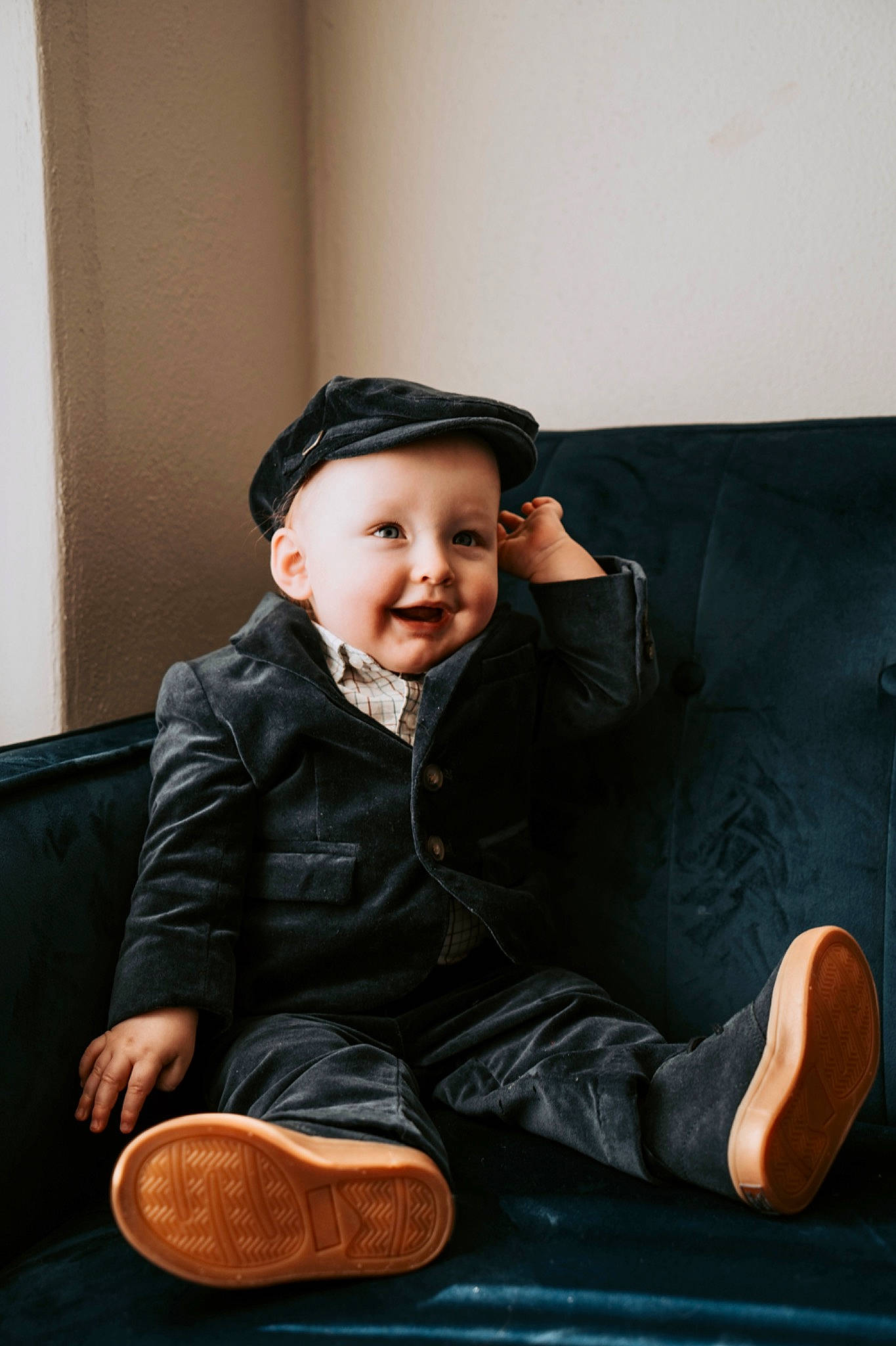 Gregory is registered to the contest to win money with this photo: child, comfort, couch, flash_photography, flooring, fun, fur, happy, headwear, human_leg, joy, lap, laugh, person, portrait_photography, room, sitting, sleeve, smile, toddler