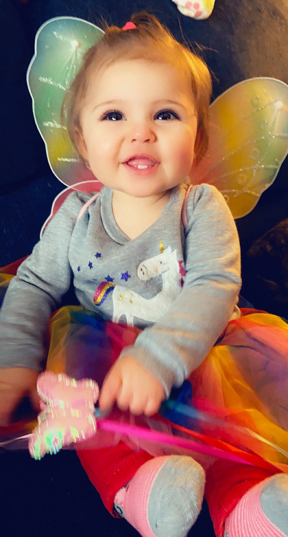 Vivian is registered to the contest to win money with this photo: baby, baby_playing_with_toys, baby_toddler_clothing, cheek, eye, face, finger, happy, head, human_body, iris, joy, nose, orange, person, photograph, pink, skin, sleeve, smile