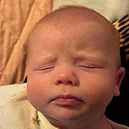 Maddilynn is registered to the contest to win money with this photo: baby, infant, face, closeup, sleeping, eyes_closed, skin, head, expression, indoors, clothing, newborn, portrait, cute, peaceful, soft, child, young, human, resting