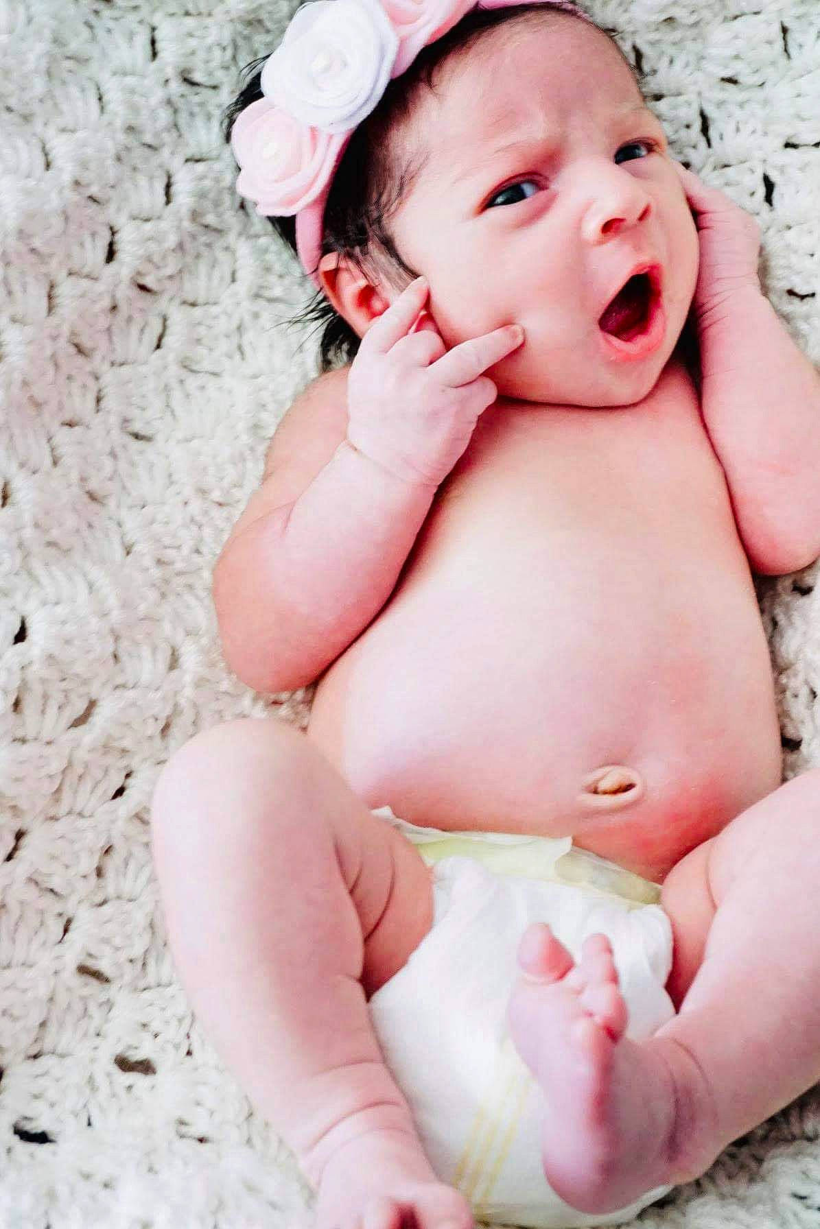 Elia is registered to the contest to win money with this photo: abdomen, baby, baby_toddler_clothing, cheek, child, mouth, muscle, person, photography, pink, product, skin, stomach, toddler, trunk