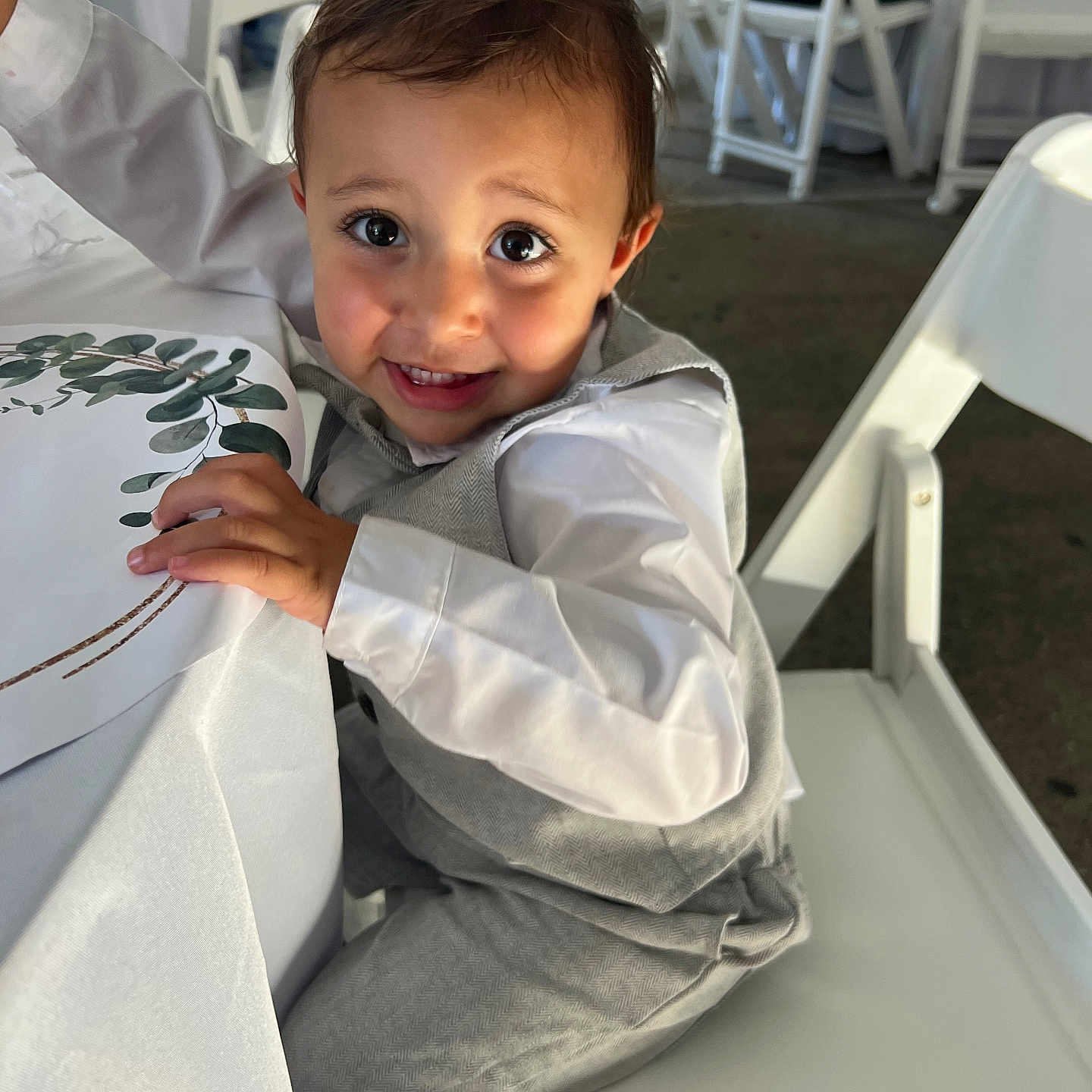 Mihalis joined the competition — help win amazing prizes! baby, bodypart, chair, clothing, coat, dress, face, finger, furniture, hand, happy, head, pants, person, photography, portrait, shirt, sitting, smile, wood