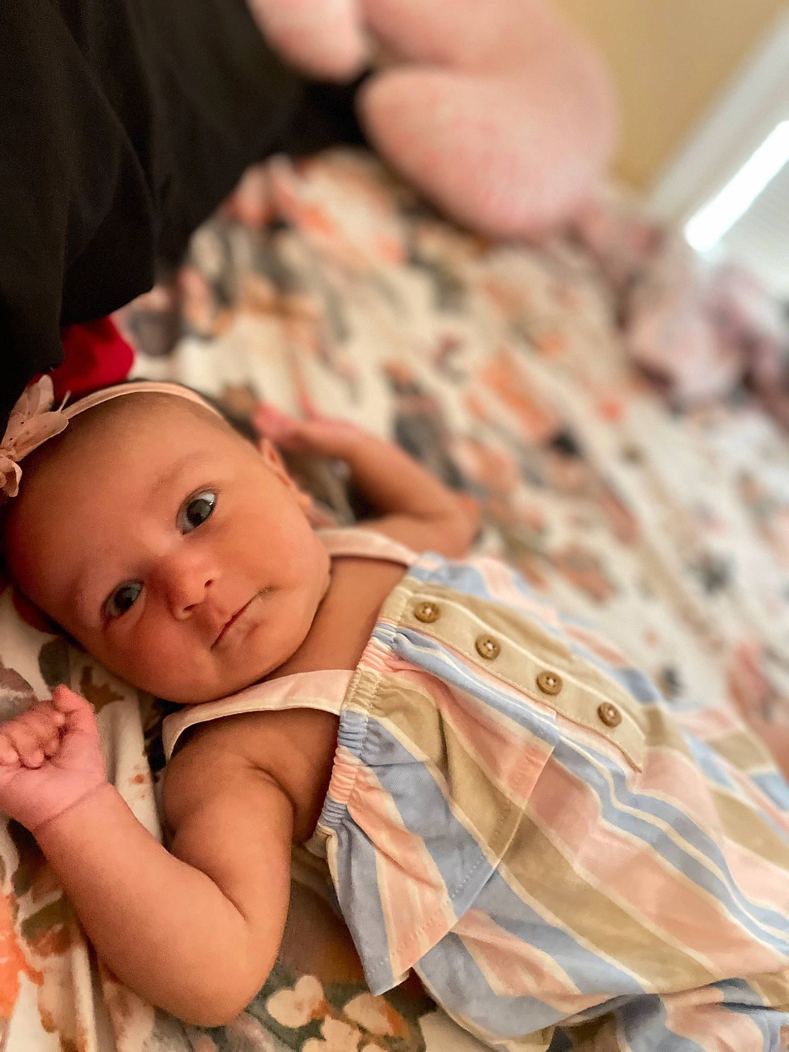 Milani joined the competition — help win amazing prizes! baby, baby_toddler_clothing, brown_hair, cheek, child, doll, eyelash, fawn, finger, hand, happy, nail, nose, pattern, peach, person, sitting, skin, toddler, toy