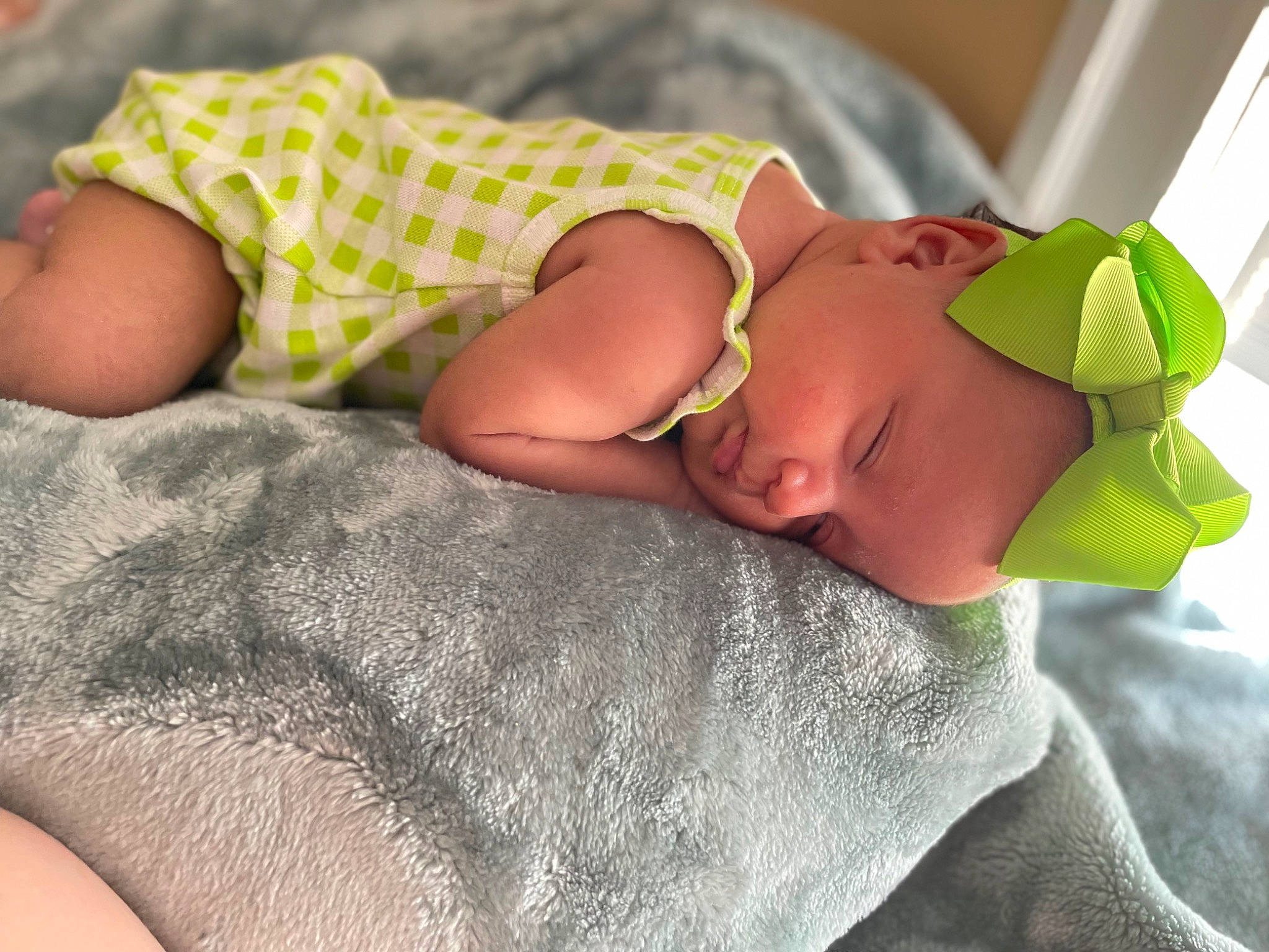 Milani joined the competition — help win amazing prizes! arm, baby, baby_sleeping, baby_toddler_clothing, bedding, bedtime, child, comfort, finger, glasses, green, hand, human_body, linens, pattern, person, skin, sleeve, textile, thigh