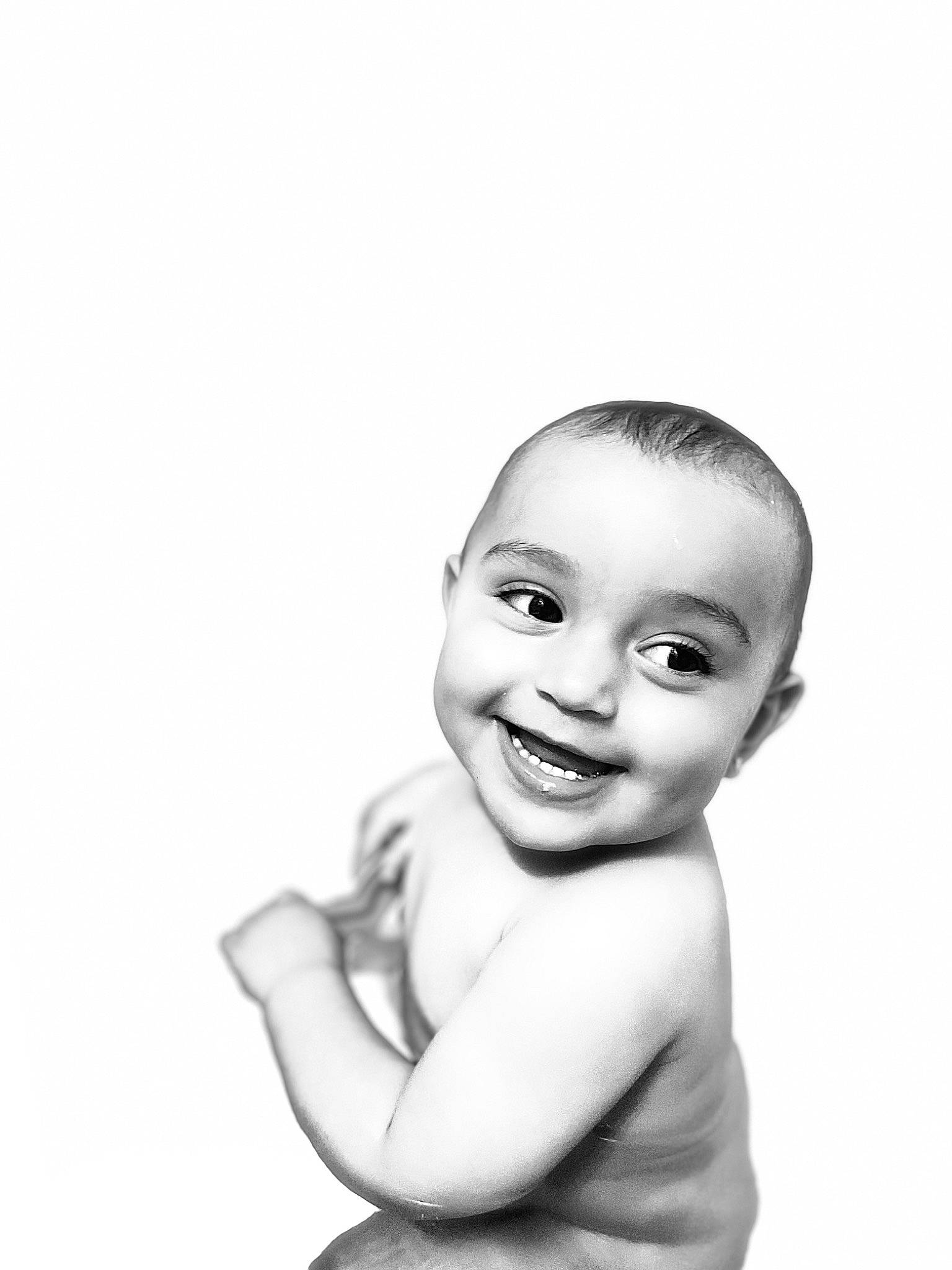 Riley is registered to the contest to win money with this photo: cheek, chest, child, eyelash, face, flash_photography, gesture, happy, iris, jaw, joy, laugh, lip, monochrome, monochrome_photography, neck, nose, person, portrait, portrait_photography