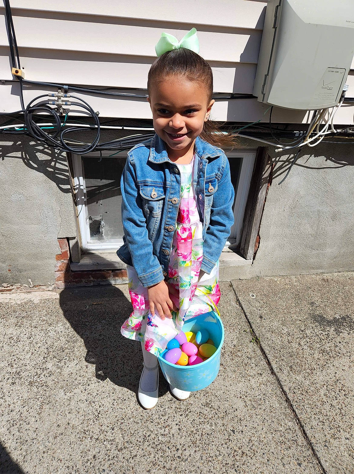 Emma joined the competition — help win amazing prizes! balloon, child, easter, electric_blue, fashion_accessory, fun, happy, holiday, jewellery, joy, leisure, liquid_bubble, party_supply, pattern, person, sandal, sitting, smile, street, t_shirt
