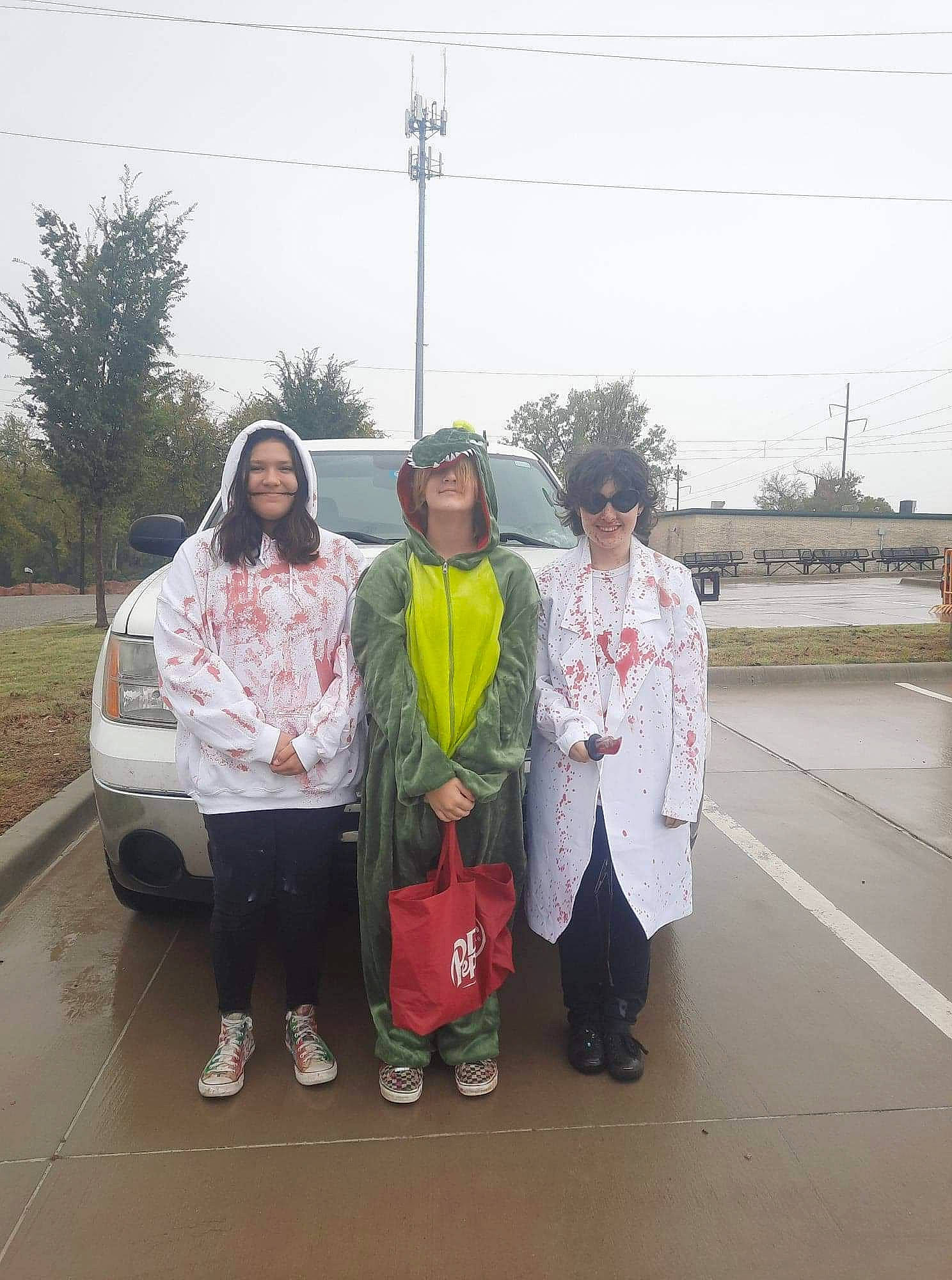 Miranda joined the competition — help win amazing prizes! asphalt, car, event, family_car, fun, gesture, headwear, joy, leisure, luxury_vehicle, motor_vehicle, pedestrian, person, plant, recreation, road, road_surface, sky, t_shirt, team