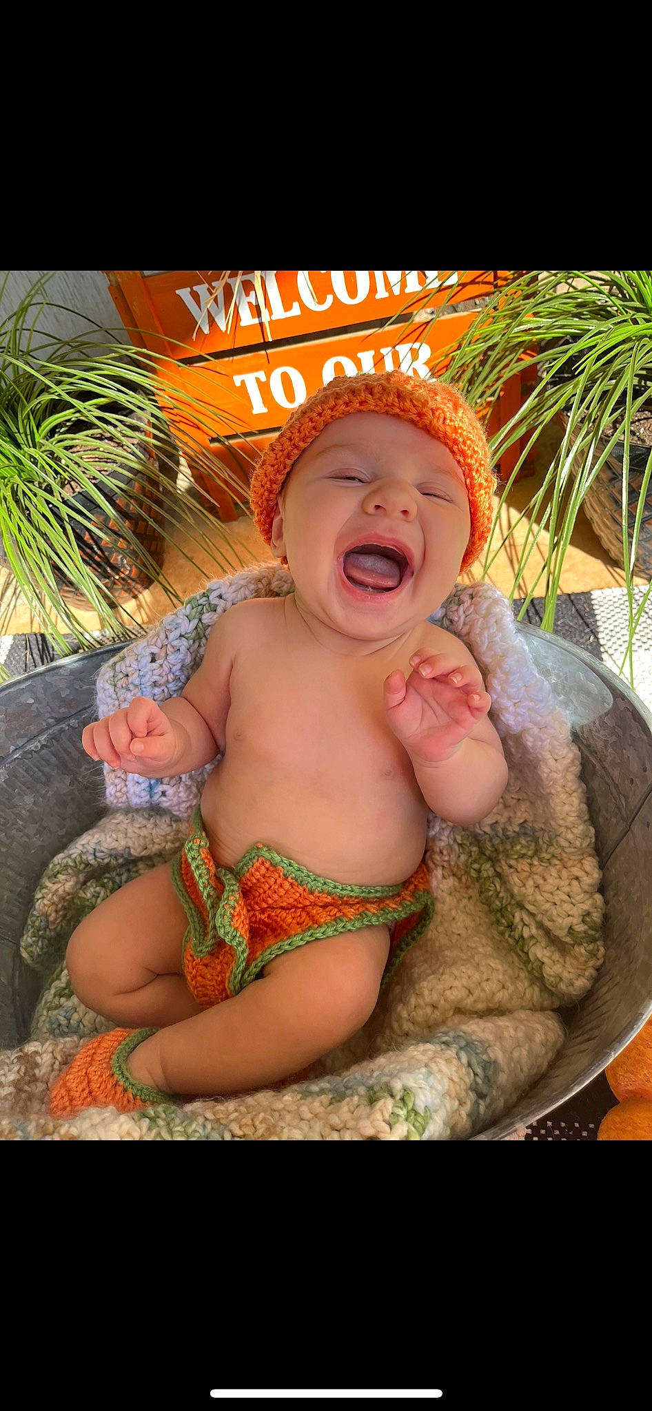 Beckham is registered to the contest to win money with this photo: abdomen, baby, chest, child, facial_expression, fun, grass, happy, headwear, leisure, mouth, navel, people_in_nature, person, plant, sitting, skin, smile, stomach, thigh