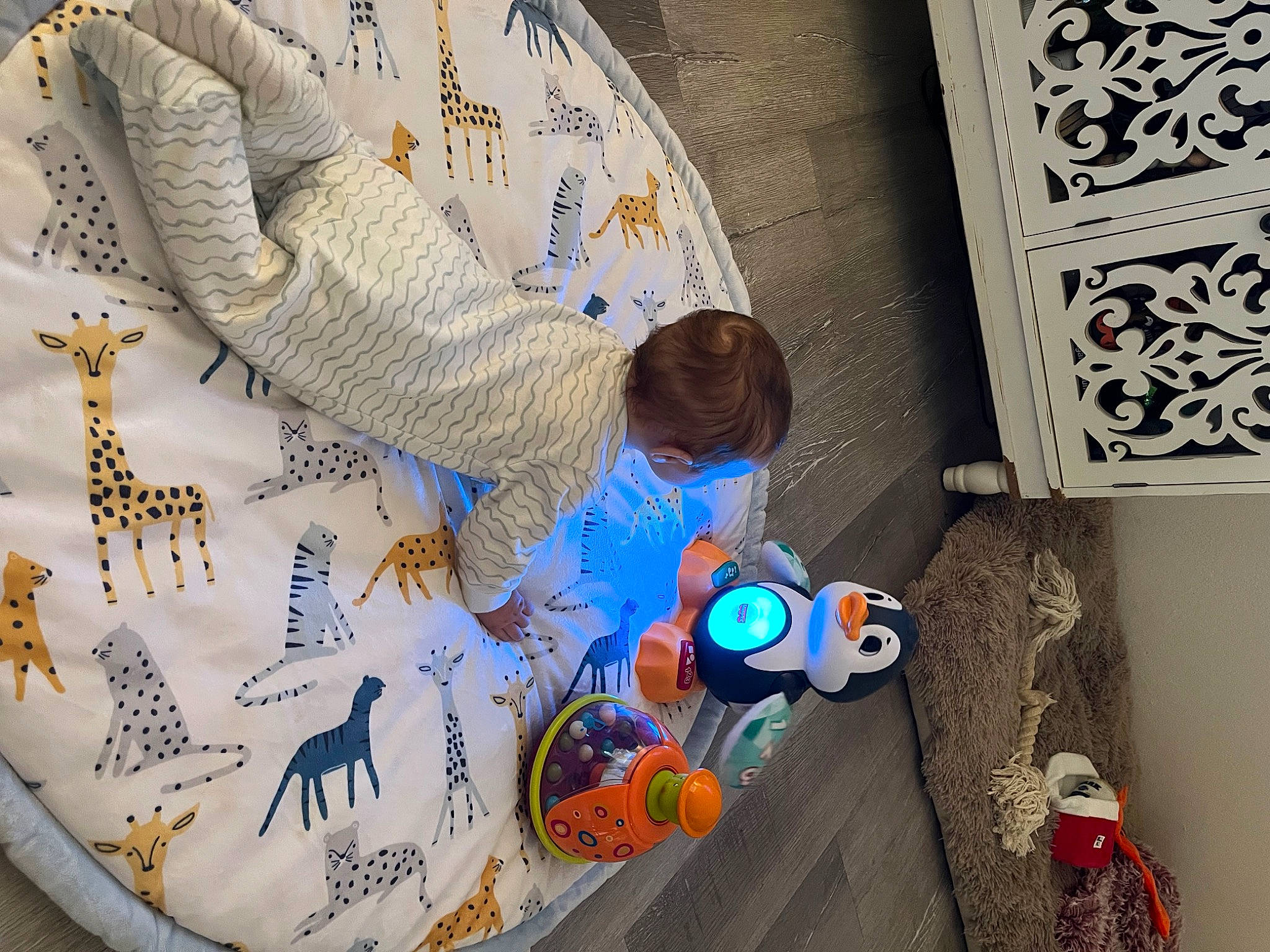 Beckham joined the competition — help win amazing prizes! art, azure, carmine, child, electric_blue, fashion_accessory, flooring, linens, paint, pattern, person, room, sleeve, space, textile, toddler, toy, vertebrate, visual_arts, wood