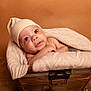 Nathan joined the competition — help win amazing prizes! baby, beanie, blanket, bonnet, cap, clothing, face, happy, hat, head, newborn, person, photography, portrait, smile, towel