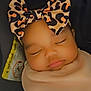 Mileena joined the competition — help win amazing prizes! baby, sleeping, bow, headband, floral_blanket, pacifier, infant, cute, peaceful, closeup, face, soft_lighting, child, adorable, cozy, resting, pink_bib, indoor, portrait, young