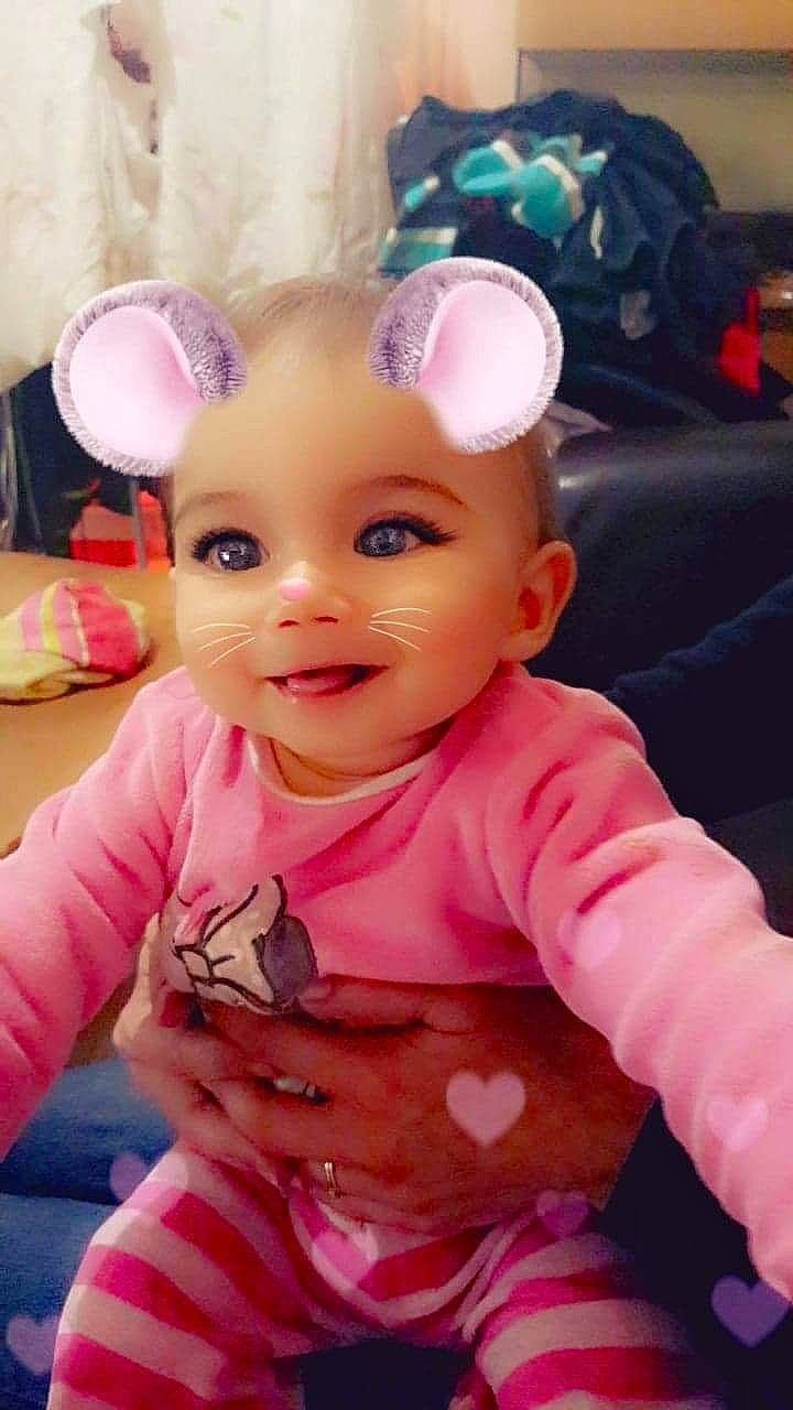 Elèna participe au concours pour gagner de l'argent avec cette photo : cheek, child, doll, ear, eye, face, head, infant, iris, person, pink, product, skin, snout, stuffed_toy, toddler, toy