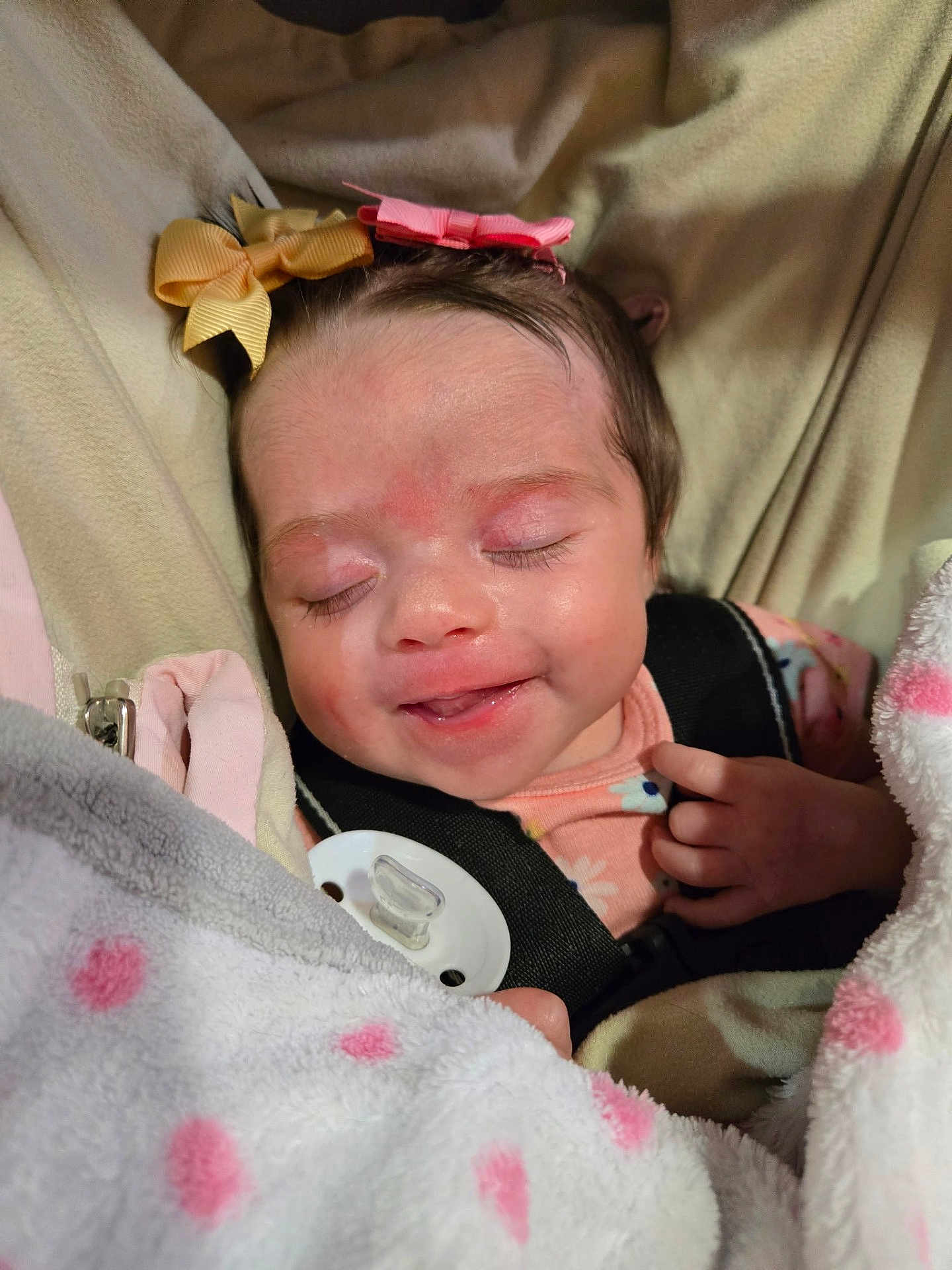 Arya joined the competition — help win amazing prizes! baby, infant, sleeping, hair_bow, bow, blanket, polka_dot, pacifier, car_seat, car_seat_strap, onesie, smile, face, hand, eyelashes, soft_fabric, pink, cozy, newborn, indoor