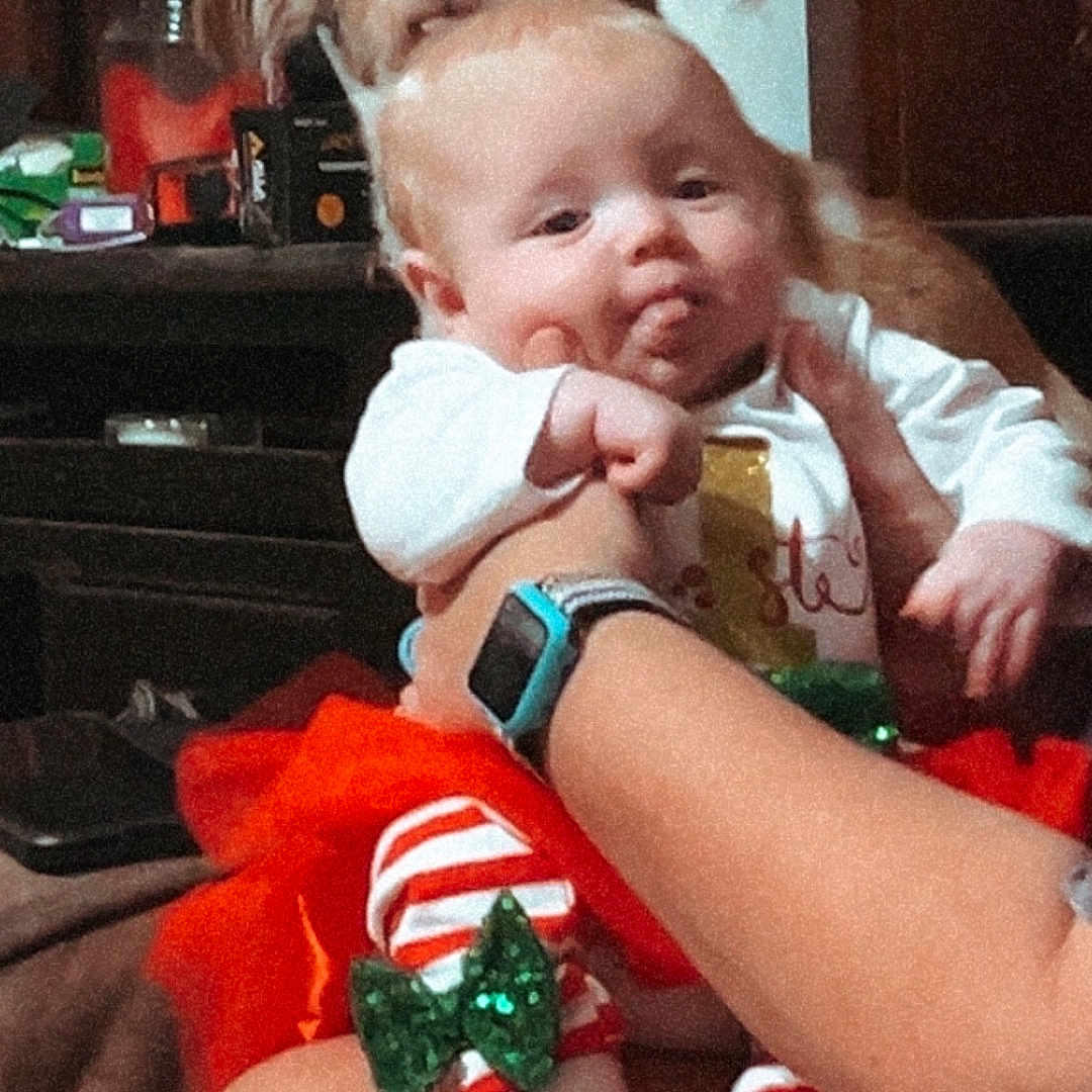 Hayzel Grace is registered to the contest to win money with this photo: animal, baby, ball, canine, clothing, couch, dog, face, football, furniture, head, person, pet, photography, portrait, puppy, shorts, soccer, soccerball, sport