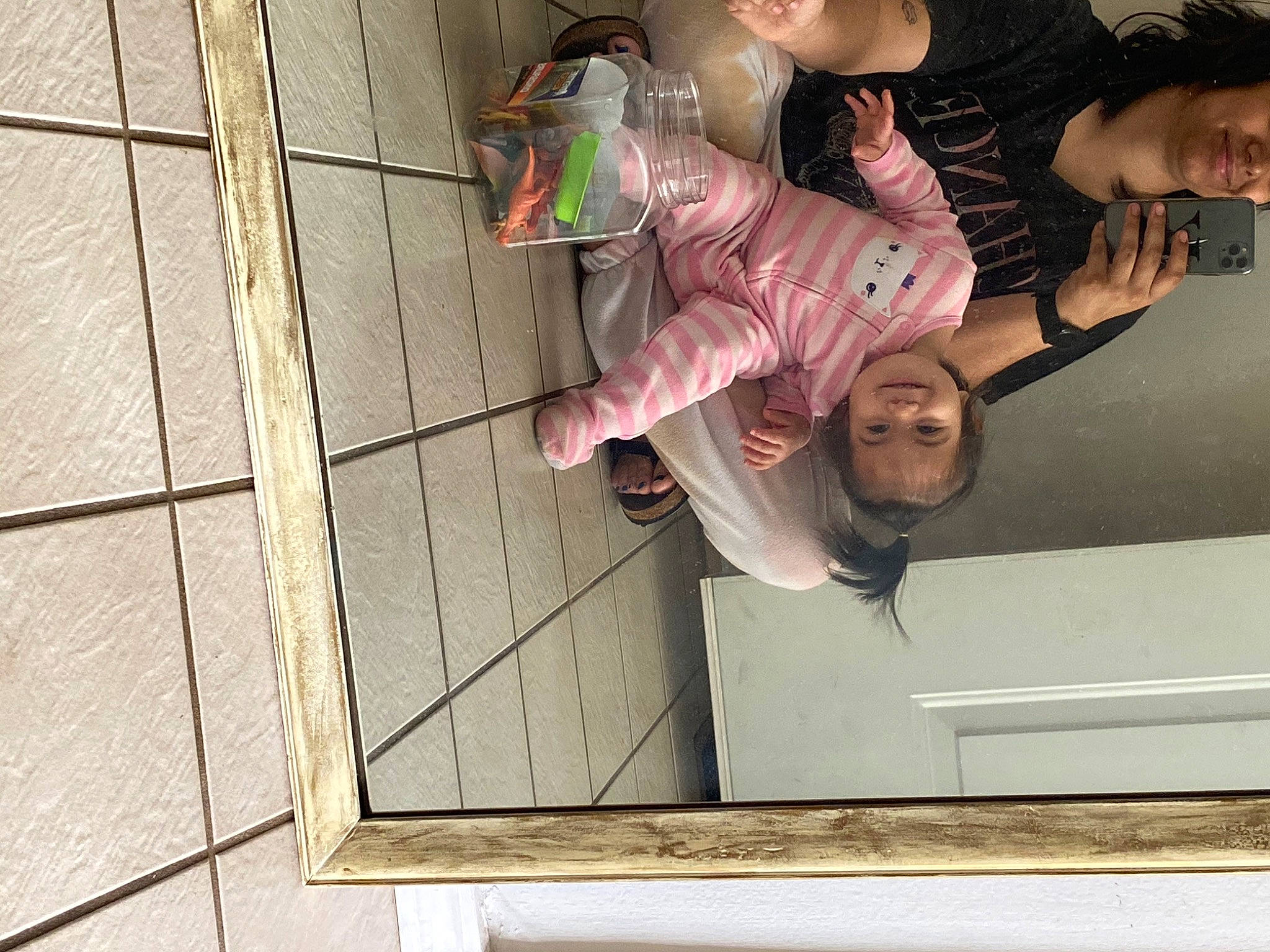 Alyson is registered to the contest to win money with this photo: baby, child, flooring, fun, gesture, hand, happy, hardwood, joy, leisure, person, photograph, rectangle, room, sleeve, smile, t_shirt, toddler, wall, window