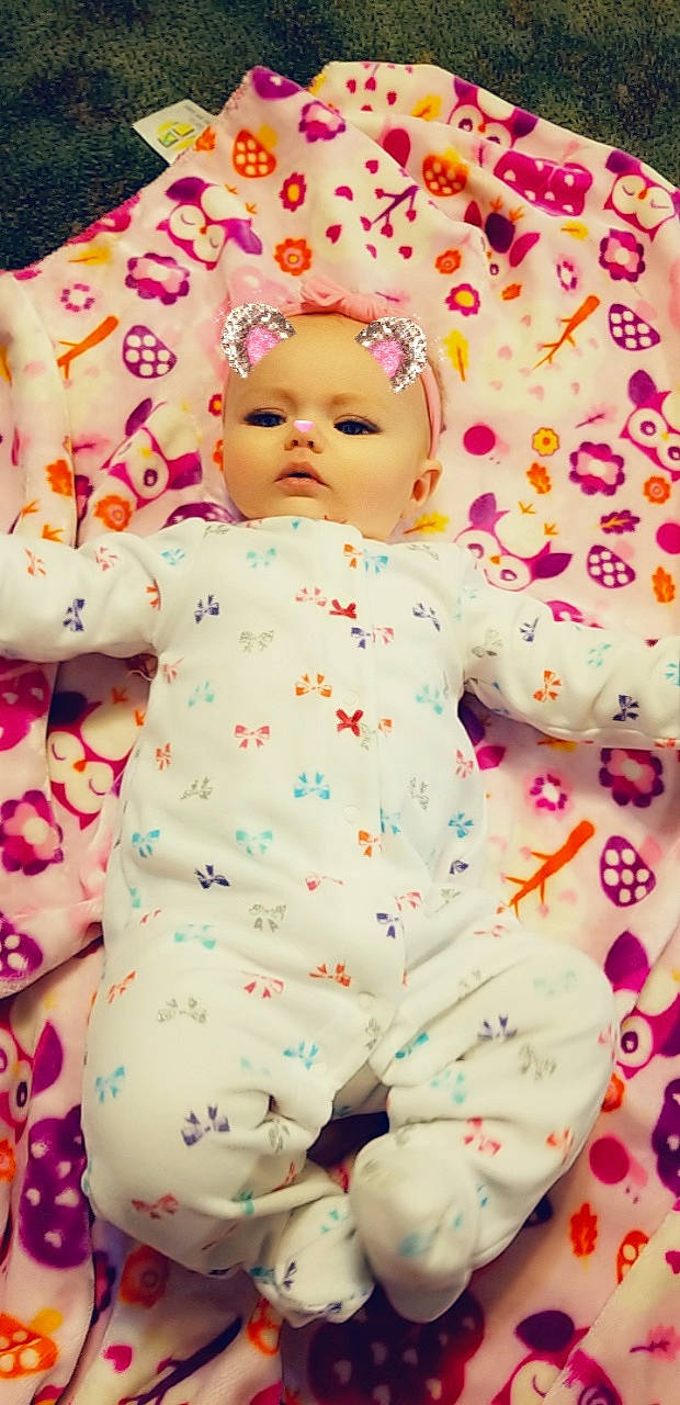 Lynnleigh is registered to the contest to win money with this photo: child, doll, infant, person, petal, pink, stuffed_toy, textile, toddler, toy