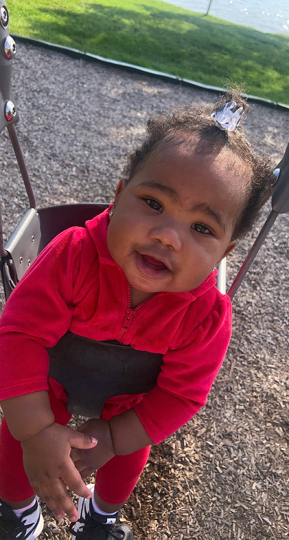 Cevyn joined the competition — help win amazing prizes! baby_toddler_clothing, child, eye, facial_expression, fun, grass, hairstyle, hand, happy, human_settlement, leisure, mouth, person, product, public_space, recreation, skin, smile, summer, swing