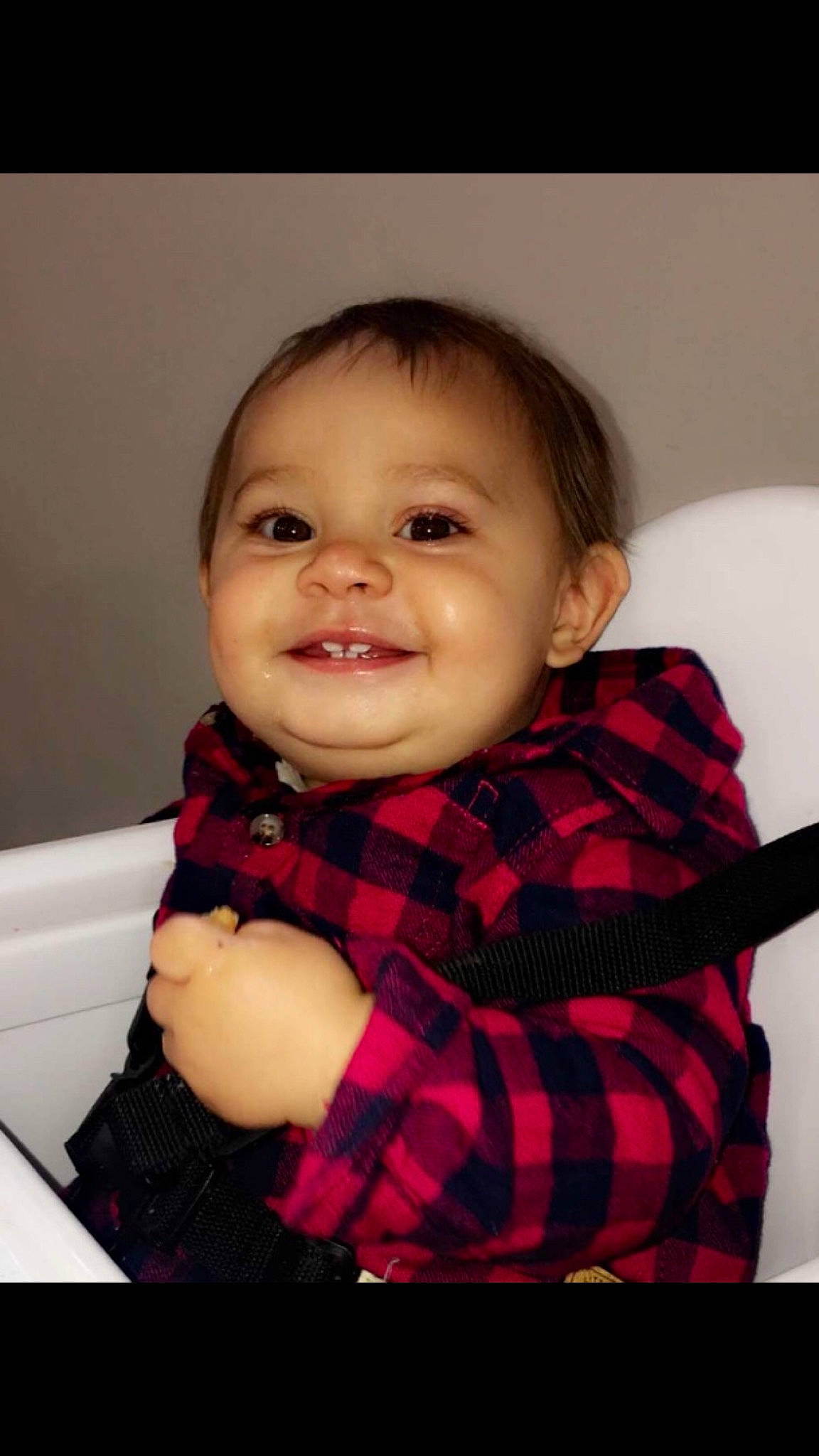Kobi joined the competition — help win amazing prizes! baby, beauty, cheek, child, chin, design, eye, face, facial_expression, happy, head, iris, joy, lip, nose, pattern, person, plaid, sitting, skin