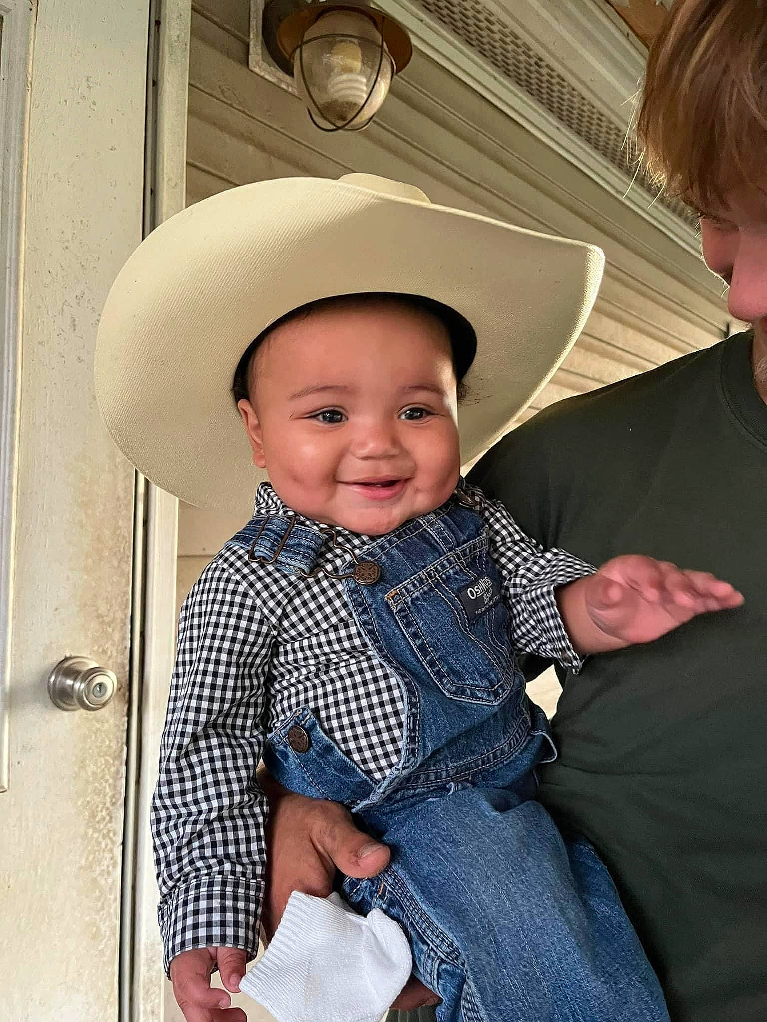 Dawson is registered to the contest to win money with this photo: baby, baby_toddler_clothing, child, chin, costume_hat, event, fashion_accessory, flash_photography, formal_wear, fun, gesture, happy, hat, joy, pattern, person, sitting, sleeve, smile, standing