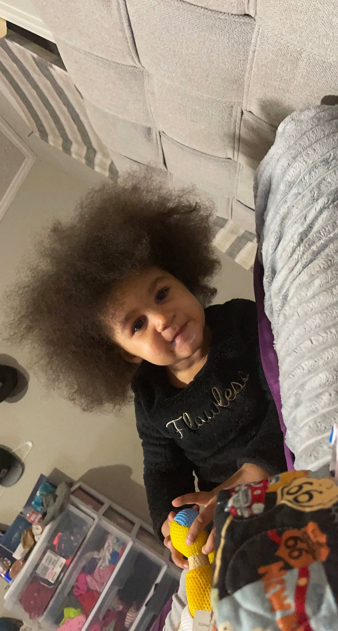 Miracle is registered to the contest to win money with this photo: audio_equipment, baby, beard, cheek, child, cool, finger, fun, happy, iris, laugh, linens, person, play, room, selfie, sitting, smile, t_shirt, toddler