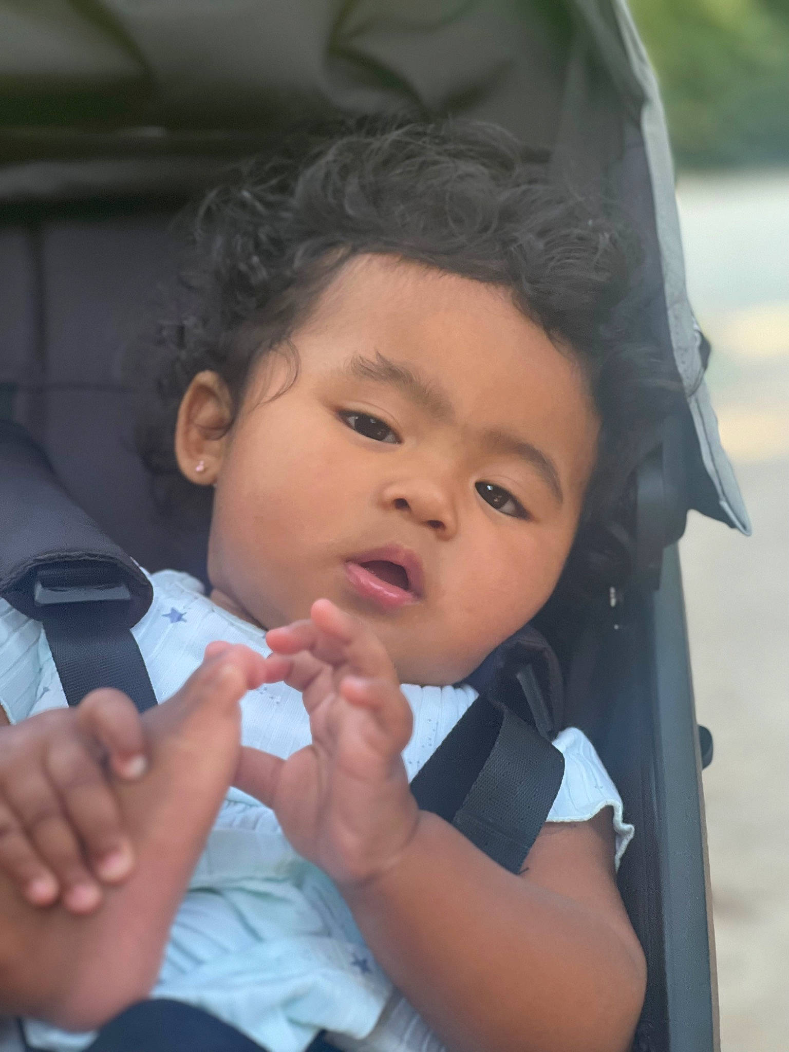 Mika joined the competition — help win amazing prizes! auto_part, baby, black_hair, cheek, child, eyebrow, eyelash, fun, gesture, hand, happy, leisure, lip, mouth, nose, person, skin, steering_wheel, thumb, toddler