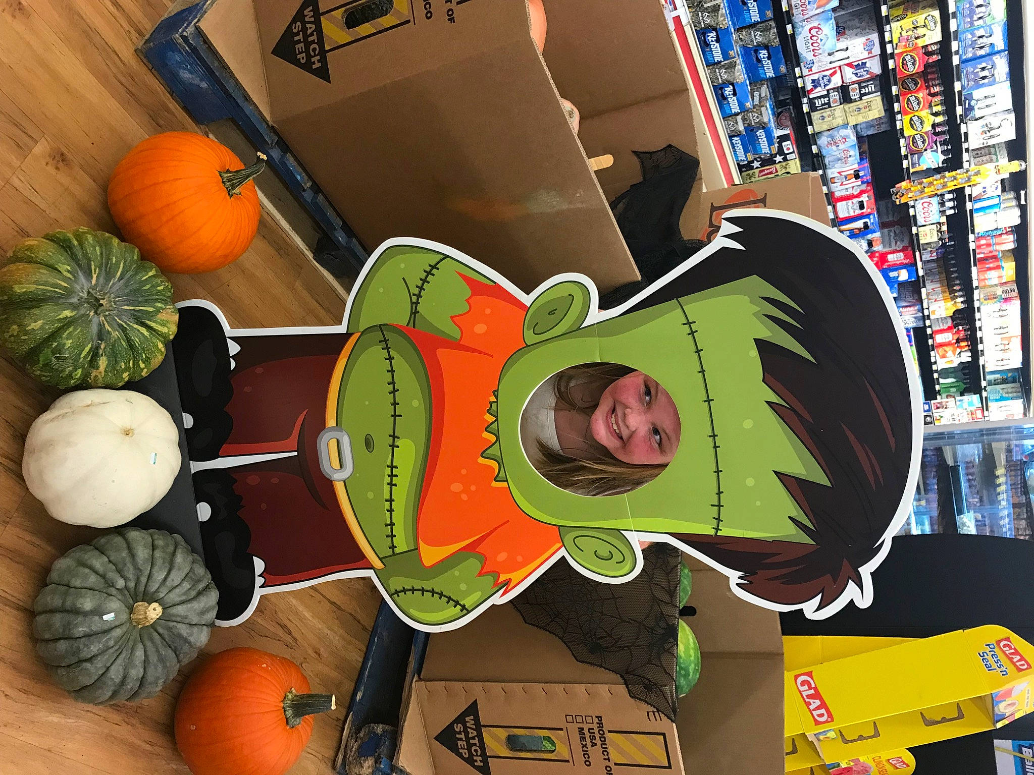 Lizzy joined the competition — help win amazing prizes! art, calabaza, cucurbita, food_group, fruit, gourd, hat, headwear, joy, local_food, natural_foods, orange, person, plant, produce, publication, pumpkin, shelf, squash, superfood