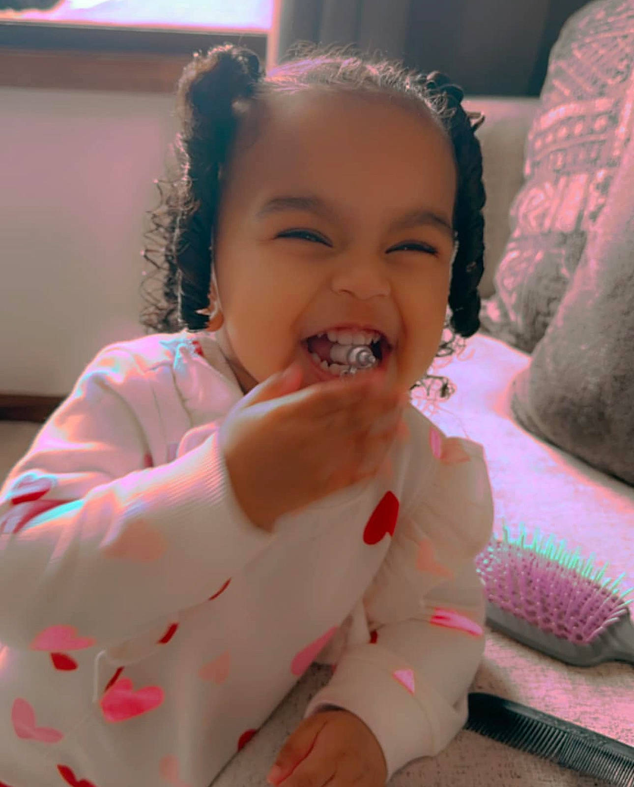 Daniela is registered to the contest to win money with this photo: baby_toddler_clothing, cheek, chin, comfort, eyebrow, finger, gesture, happy, head, iris, lip, mouth, nose, person, pink, skin, sleeve, smile, thumb, toddler