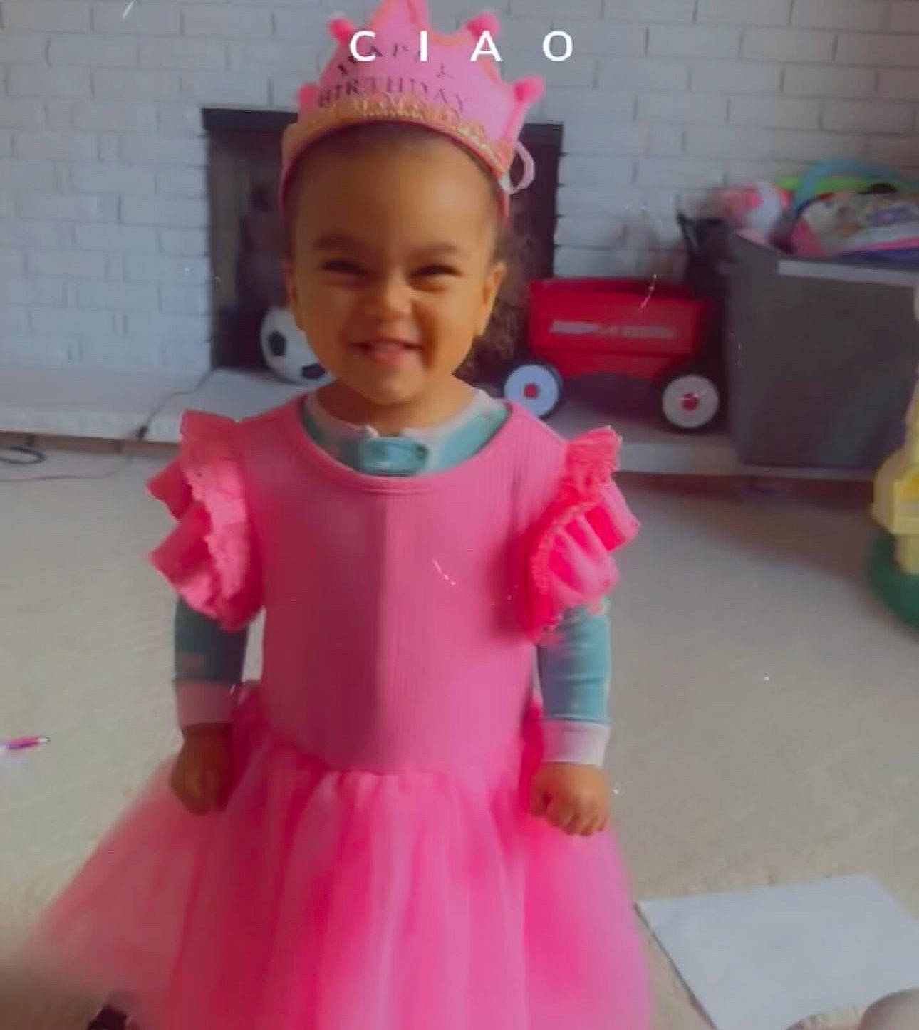 Daniela joined the competition — help win amazing prizes! baby, baby_toddler_clothing, child, costume_hat, crown, day_dress, dress, facial_expression, fashion_design, fun, happy, joy, magenta, one_piece_garment, peach, person, photograph, pink, sleeve, smile