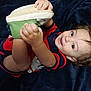 toddler, child, baby, smiling, shoe, hand, face, hair, blanket, clothing, striped, cute, playful, lying_down, indoors, portrait, happy, skin, footwear, person
